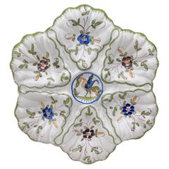 Assiette à huîtres en faïence française de style Moustiers, vers 1940