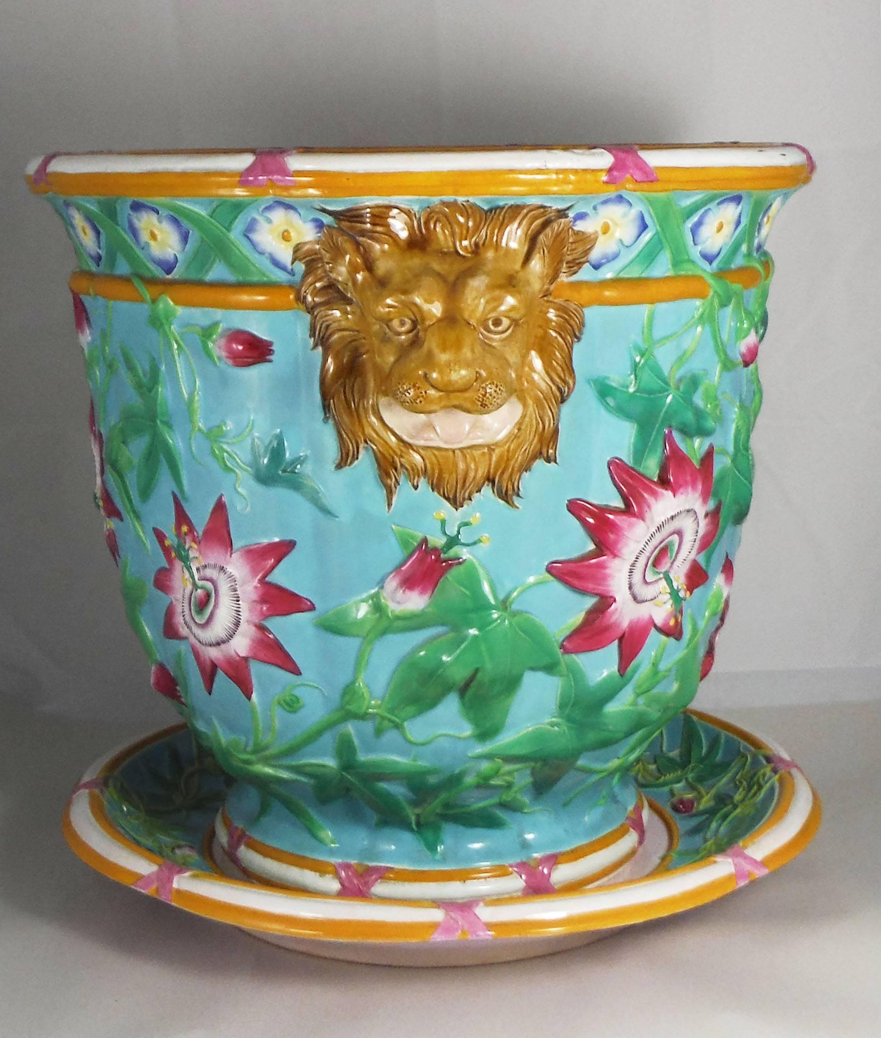19th-Century monumental Victorian jardinière in the passion flower pattern on turquoise aqua background, with lion mask handles, moulded in high relief with trailing foliage, flowers and buds, beneath a trellis frieze with flowerhead centres, pink