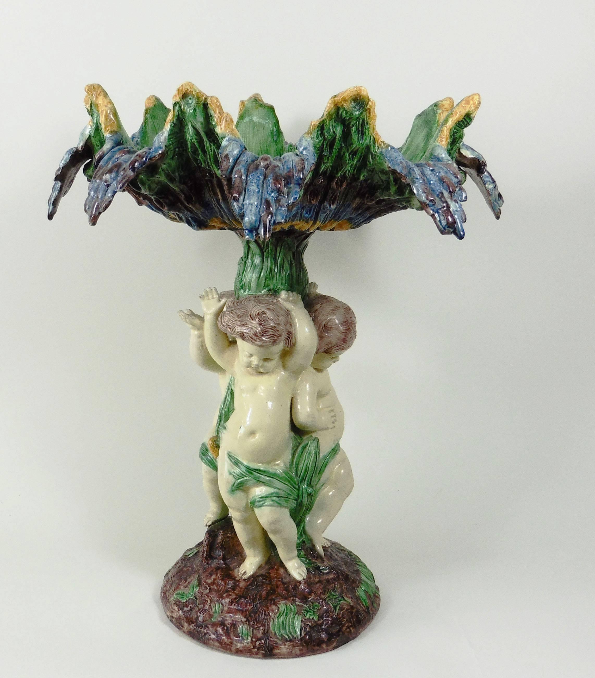 Large Palissy centrepiece with three puttis, on the top a large shell attributed to Thomas Sergent (School of Paris) circa 1890.
The School of Paris is composed by makers as Victor Barbizet, Francois Maurice, Thomas Sergent, Georges Pull, it's a