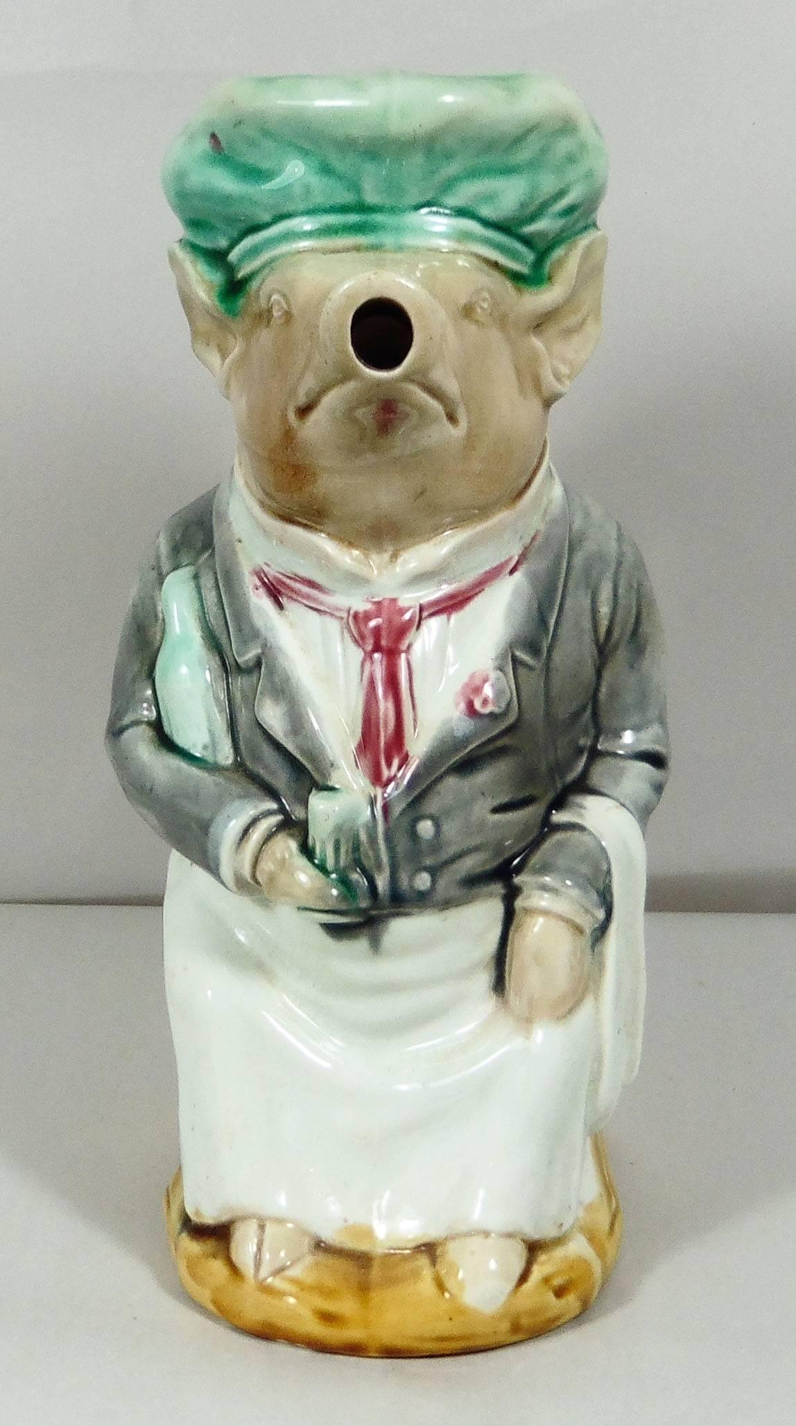 French Majolica Pig dressed as a waiter signed Onnaing, circa 1900.
Reference / 