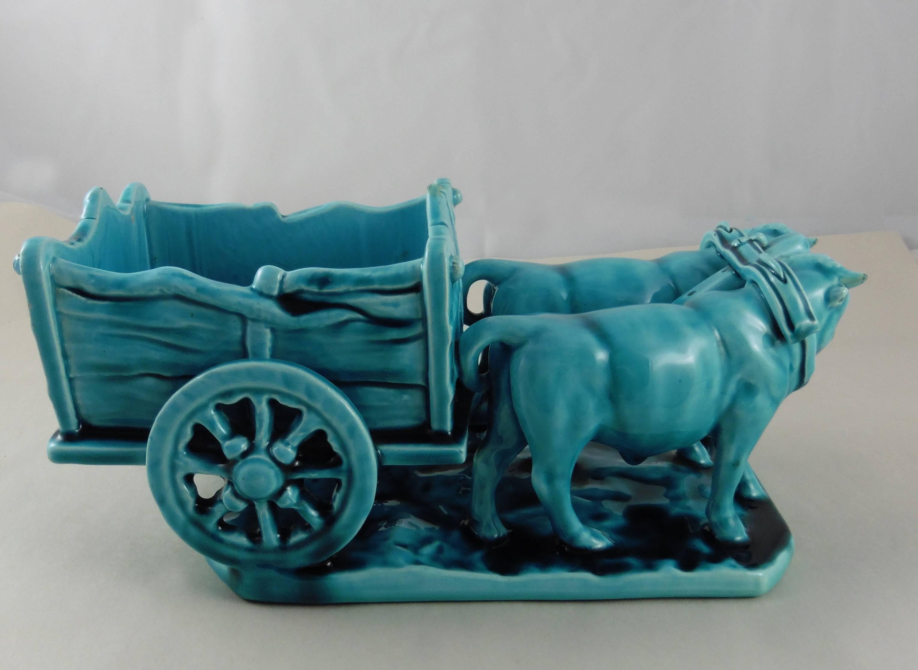 Antique majolica turquoise jardinière with oxen cart, circa 1900, signed M C M Golfe-Juan.
Reference: Page 111 