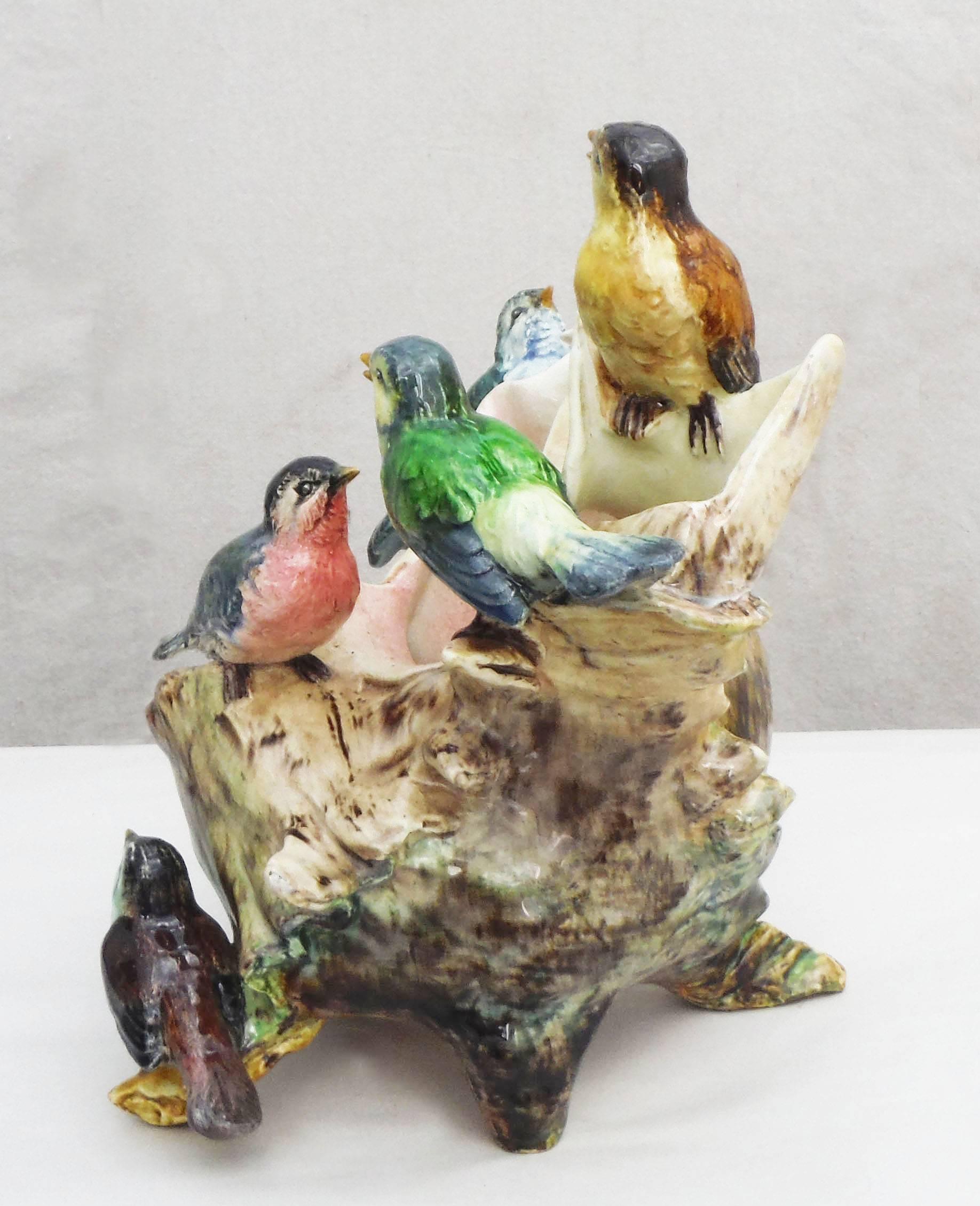 A stunning large Majolica shell with five birds, very colorful signed Delphin Massier.
The Massier are known for the quality of their unique enamels and paintings.
The Massier family produced differents pieces with birds in a very creative style
