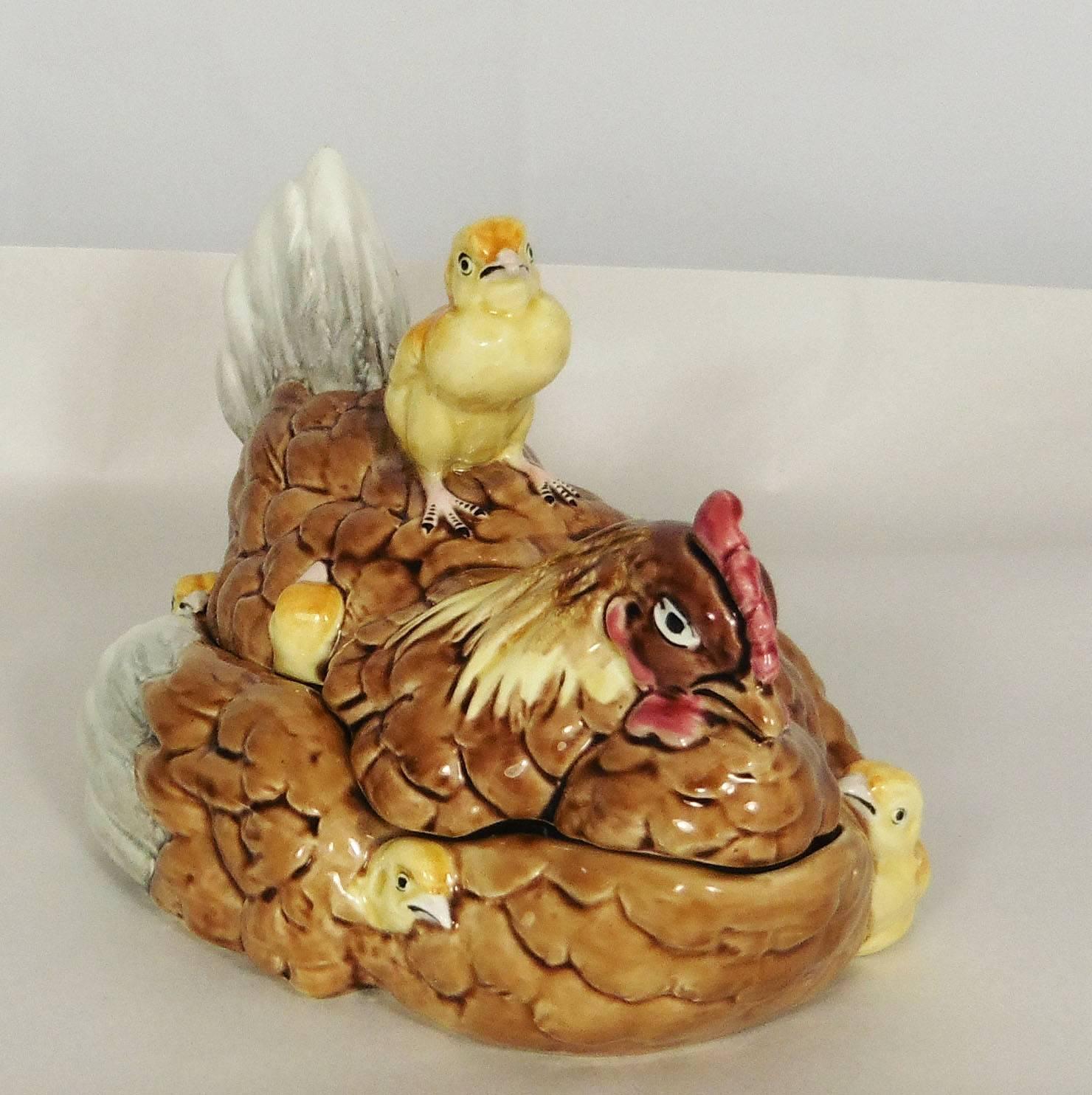 A very rare 19th Majolica hen tureen with chicks all around the tureen and one for handle signed George Dreyfus.
The Majolica of Georges Dreyfus are usually colorful in a fine quality of glaze and paintings.