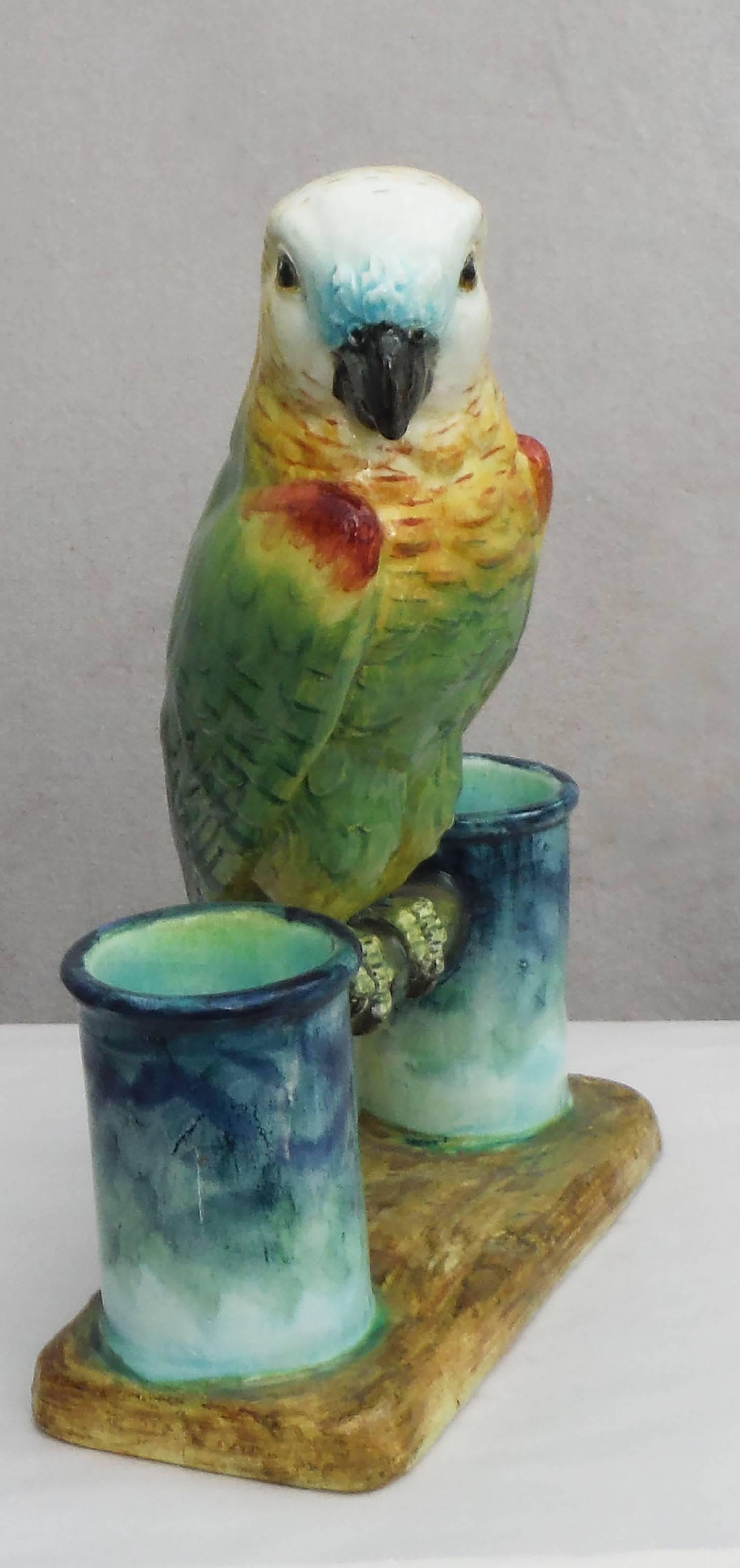 A stunning large 19th Majolica parrot signed Delphin Massier very colorful.
 The Massier are known for the quality of their unique enamels and paintings. The Massier family produced differents pieces with birds in a very creative style in Vallauris