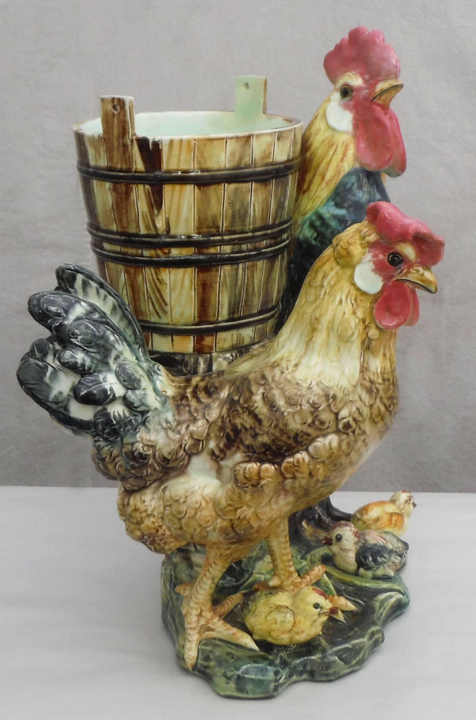 Spectacular large Majolica vase jardiniere with a rooster ,hen and chicks, Massier unsigned, circa 1890.
The Massier produced roosters in a big range of sizes, this is the medium size. The roosters are the symbol of France and they were very