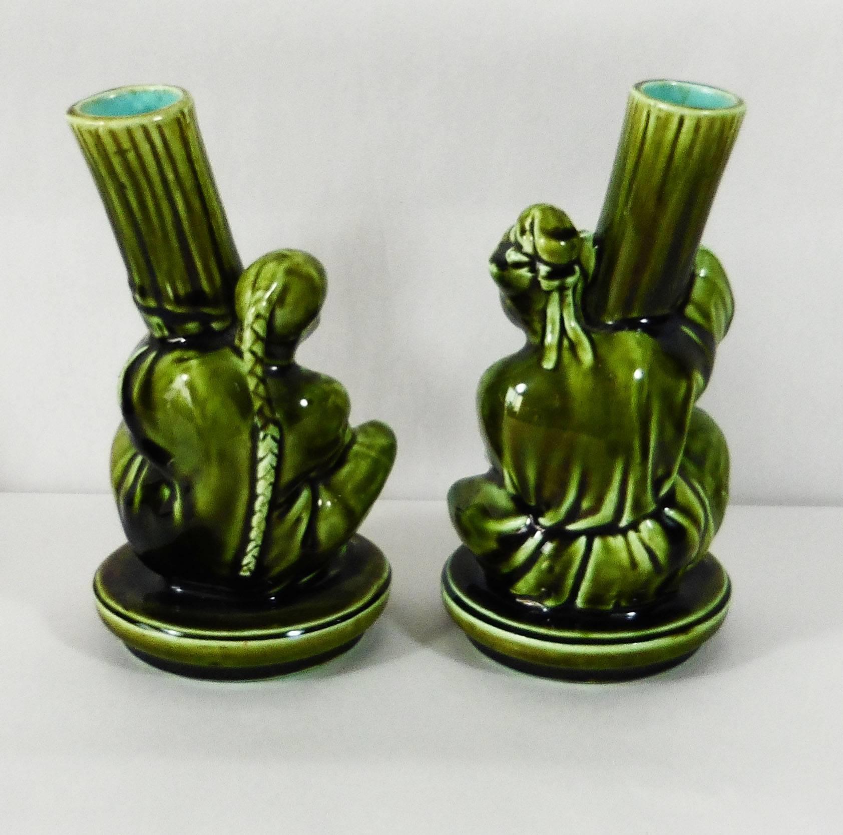 Antique green Majolica pair of Japonese or Chinese women and man holding bambou vases signed Sarreguemines Majolica, circa 1870.
Early French Majolica inspired by the Art movement Japonism of the end of 19th century.