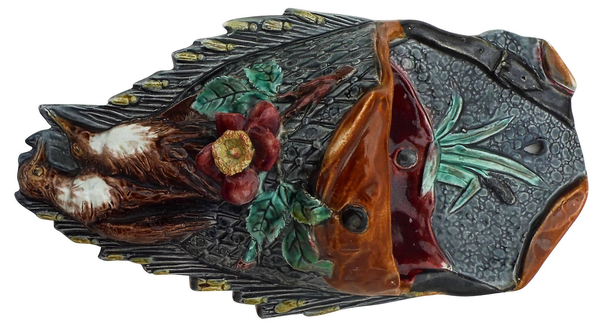 French Majolica gamebag wall pocket with birds trophies decorated with flower, circa 1890.