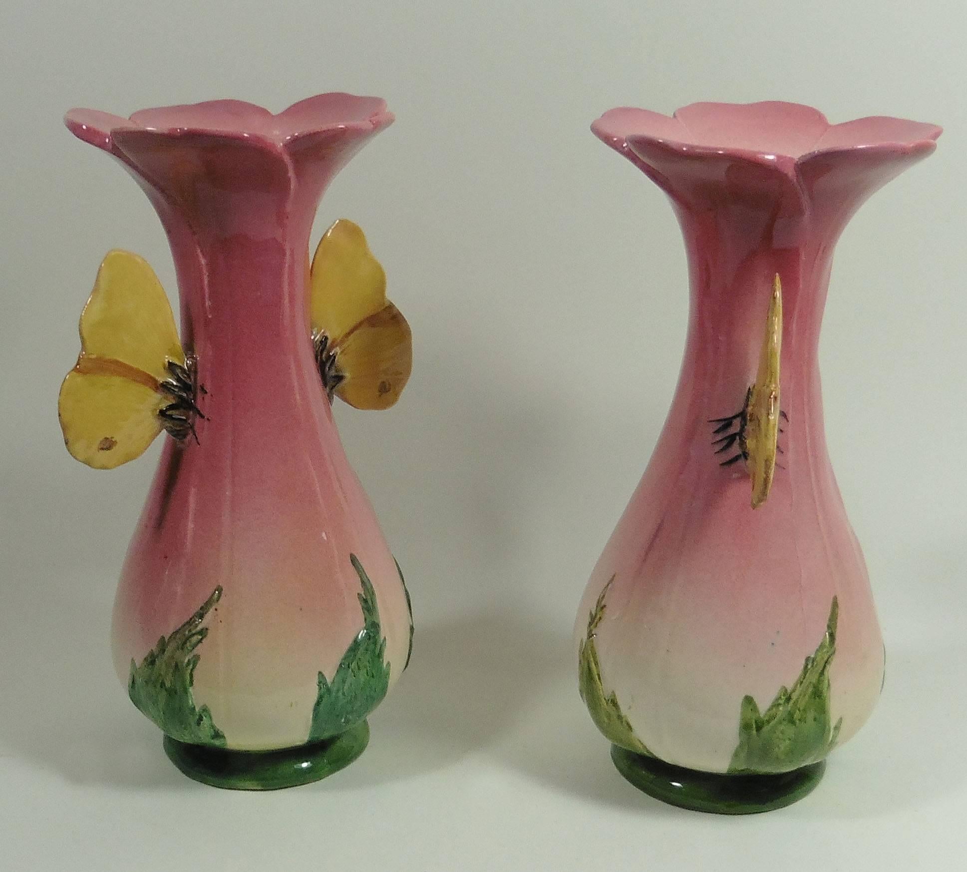 Rare pair of majolica pink vases with yellow butterflies handles signed Delphin Massier, circa 1890.
The Massier are known for the quality of their unique enamels and paintings. The Massier family produced different pieces with birds in a very