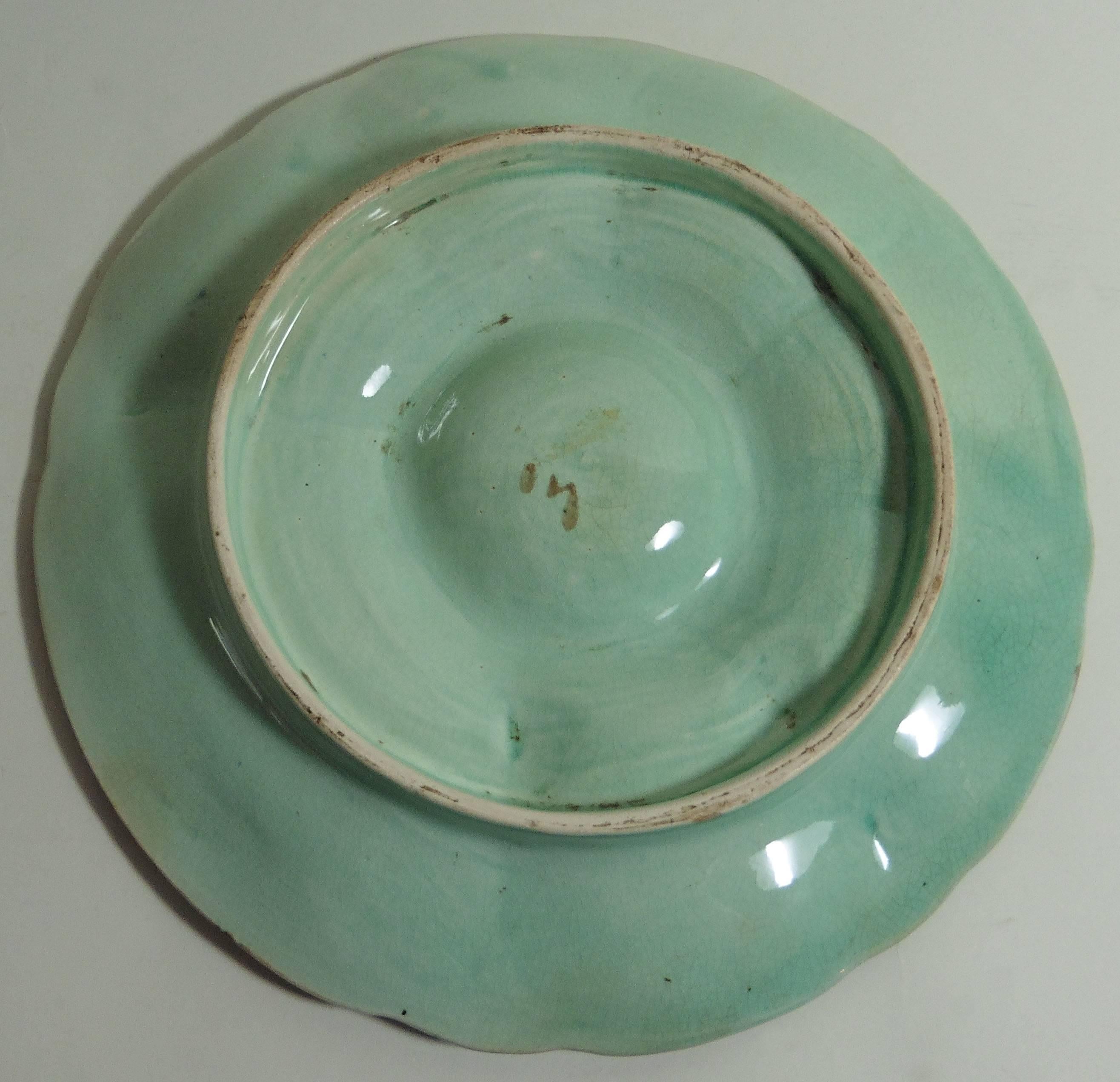 Large blue Majolica oyster plate with leaves and flowers from the manufacture of Wasmuel (Belgium), circa 1890.