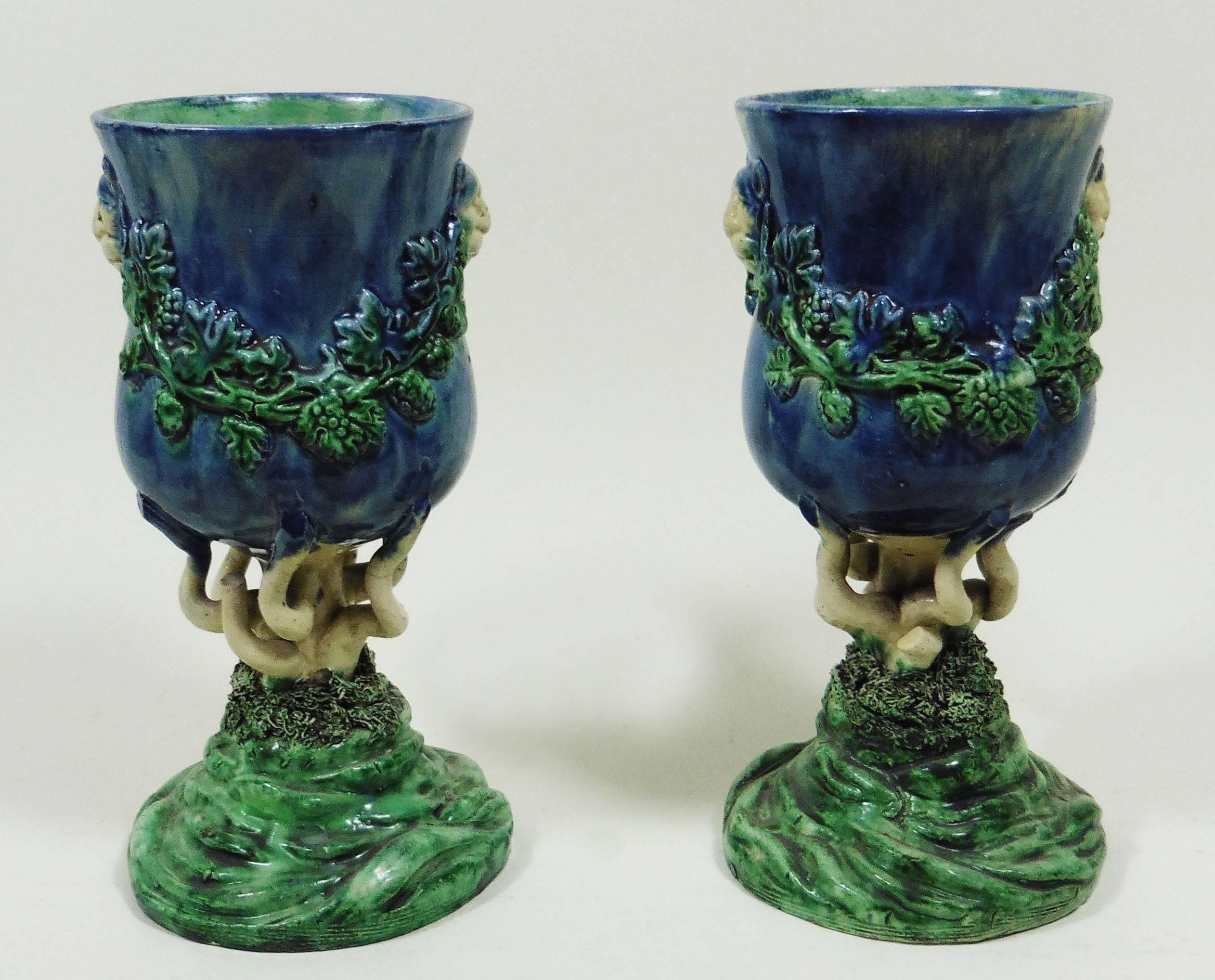 Pair of 19th century Palissy chalices with lions heads and grapes garlands, the feets are stylized seaweeds in a Renaissance style.
Attributed to the School of Paris.
Hairline on the back of one chalice.
The School of Paris was composed by makers