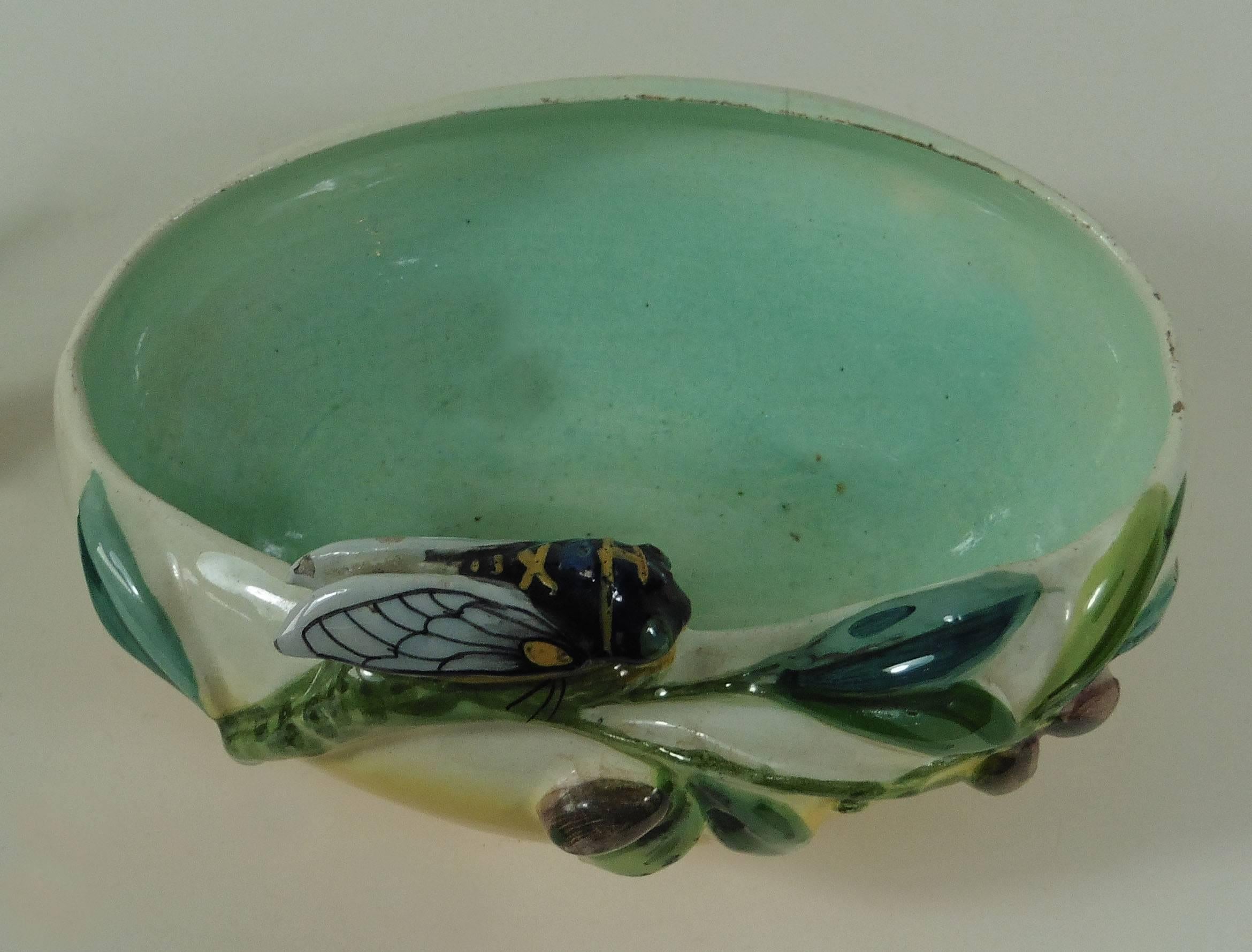 French Majolica oval jardiniere with cicada and olive in relief signed Jerome Massier Fils, circa 1910.
A typical piece from Provence.