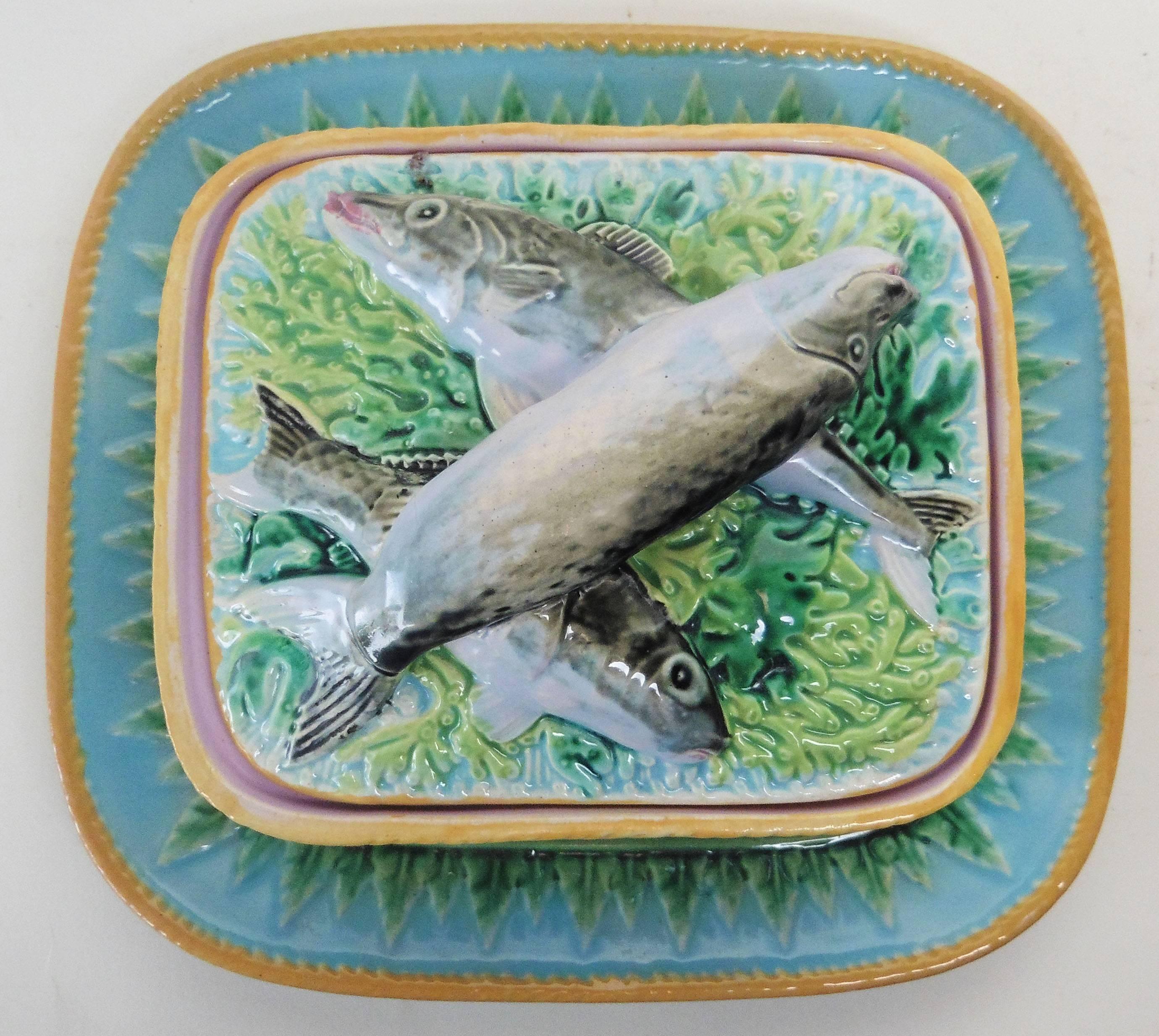 Complete colorful turquoise Victorian Majolica sardine box with the underplate signed George Jones dated around 1875 with the crescent mark.
Reference / Page 96 