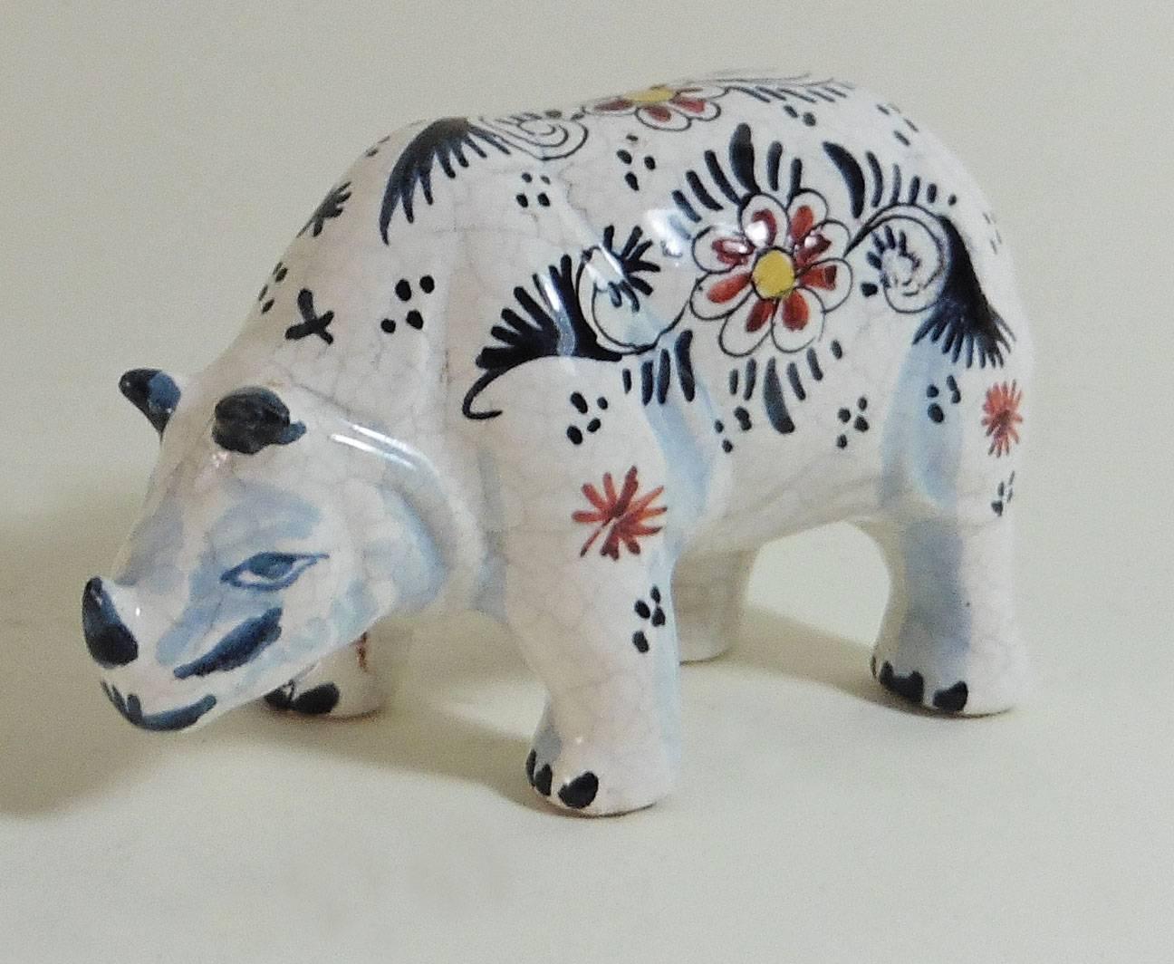 French faience blue and white rhinoceros attributed to Desvres, circa 1910.
Minor hairlines on the glaze.