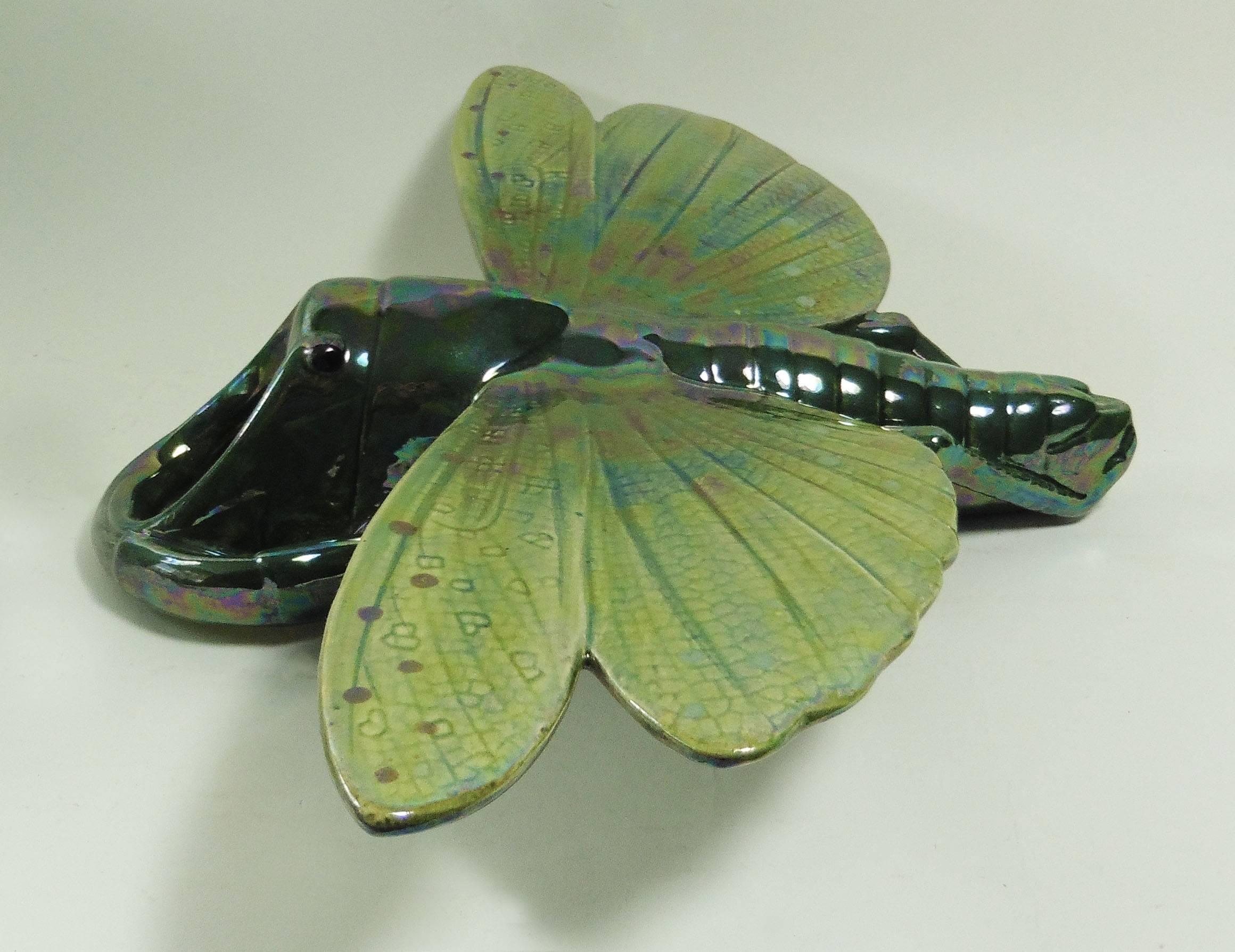 Large Majolica wall pocket insect in a green iridescent color, circa 1910.
Model number 4401.