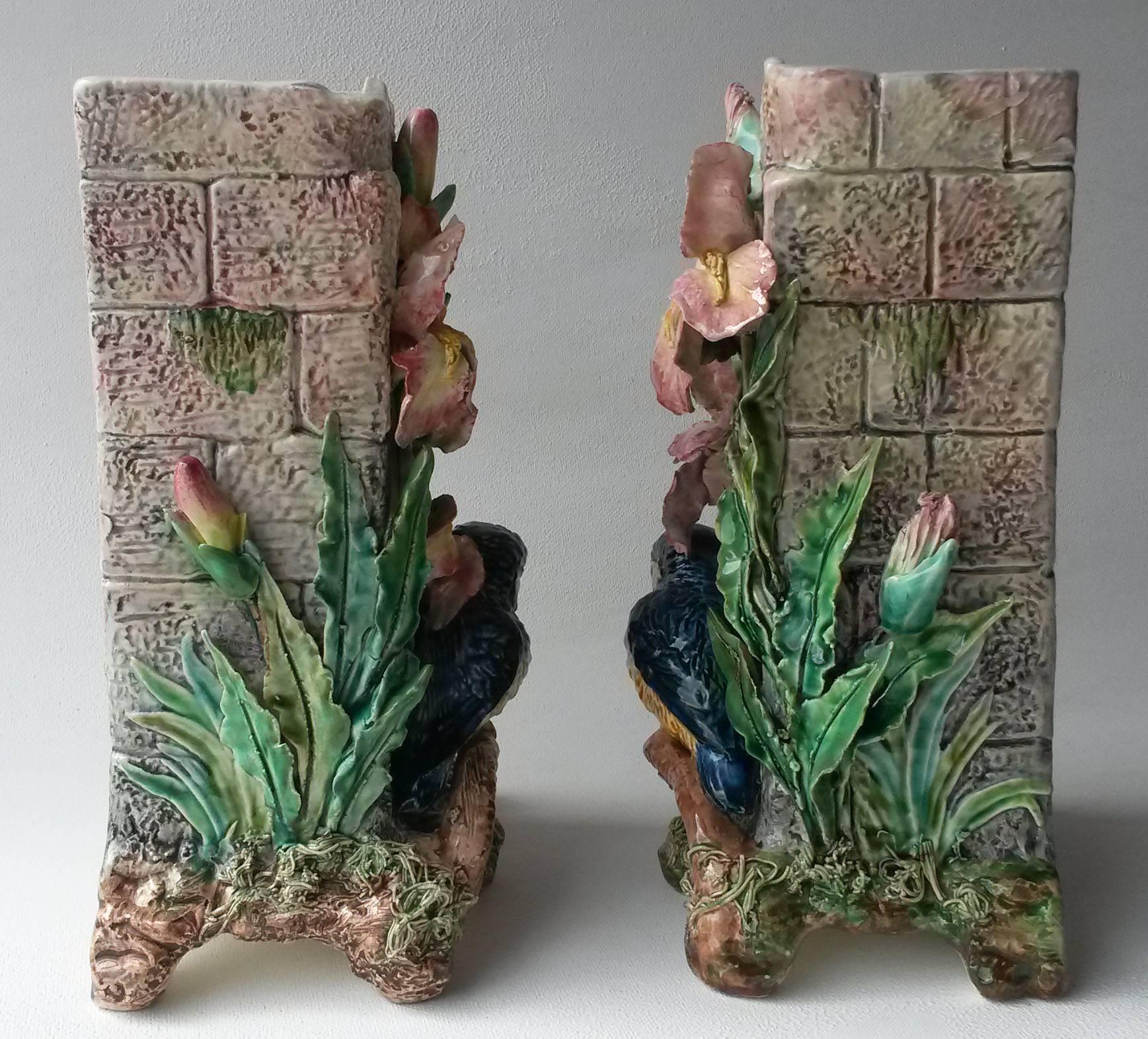 Elegant 19th century French Majolica pair of vases attributed to Fives Lille.
The vases are shaped like walls decorated on the front with kingfishers on branches, on the base mushrooms and herbs, above the birds large pink lilies all in high