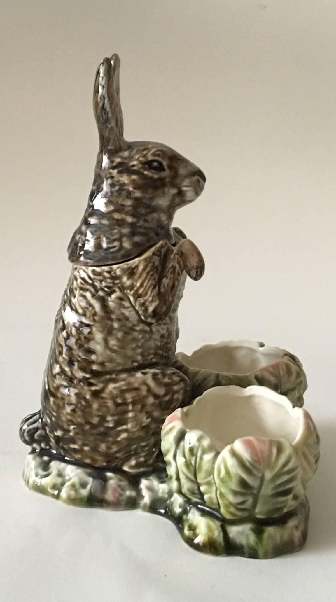 Rare and unusual Austrian Majolica complete condiment stand: Salt, pepper and mustard, the piece represent a rabbit who stand behind the salt and pepper cabbage. The spoon represent a part of the leg of the rabbit.