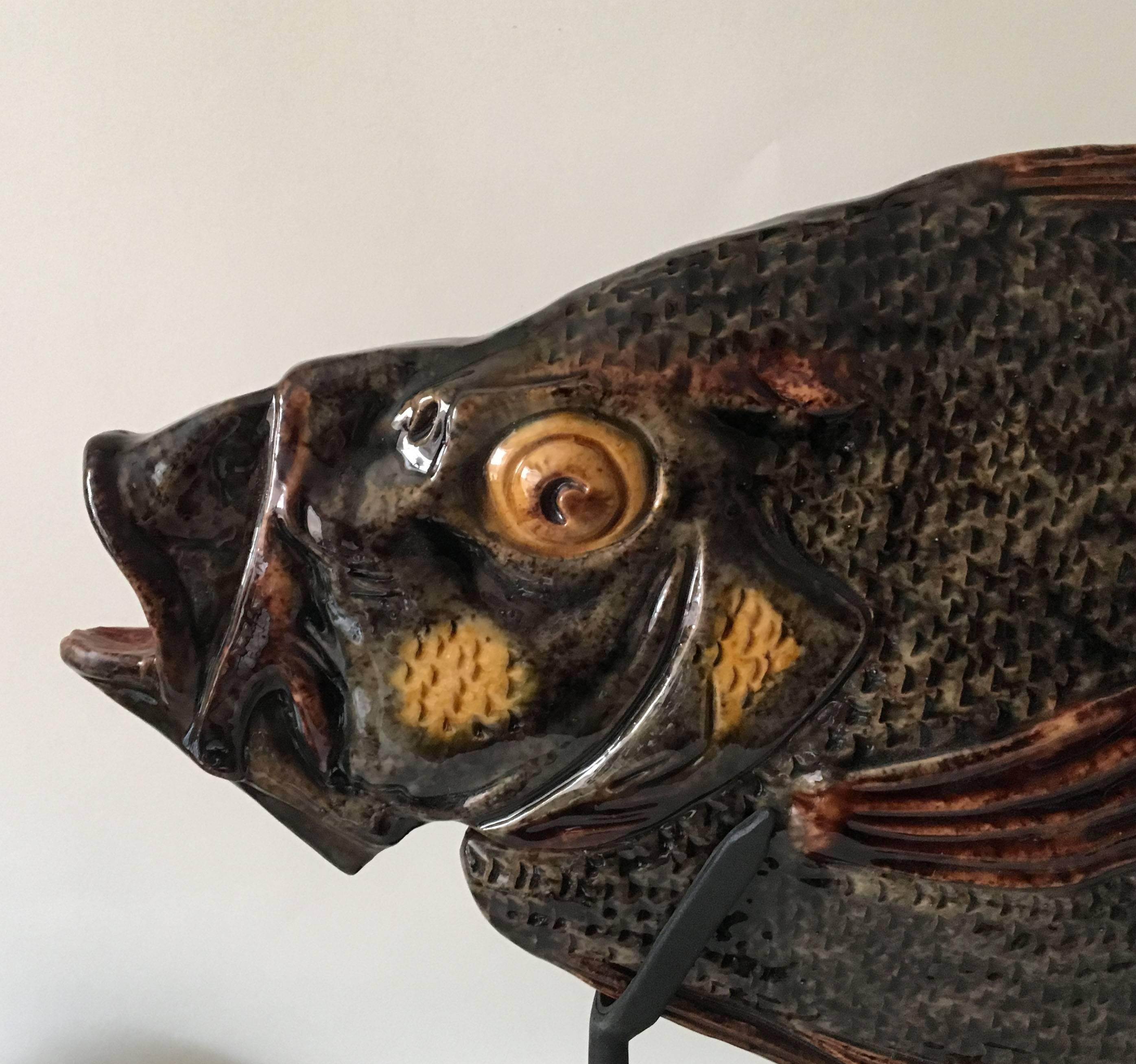 Monumental Palissy called St Pierre, Peter's Fish or John Dory, circa 1880 presented with a contemporary metal stand attributed to the School of Paris.
The School of Paris was composed by makers as Victor Barbizet, Francois Maurice, Thomas Sergent,