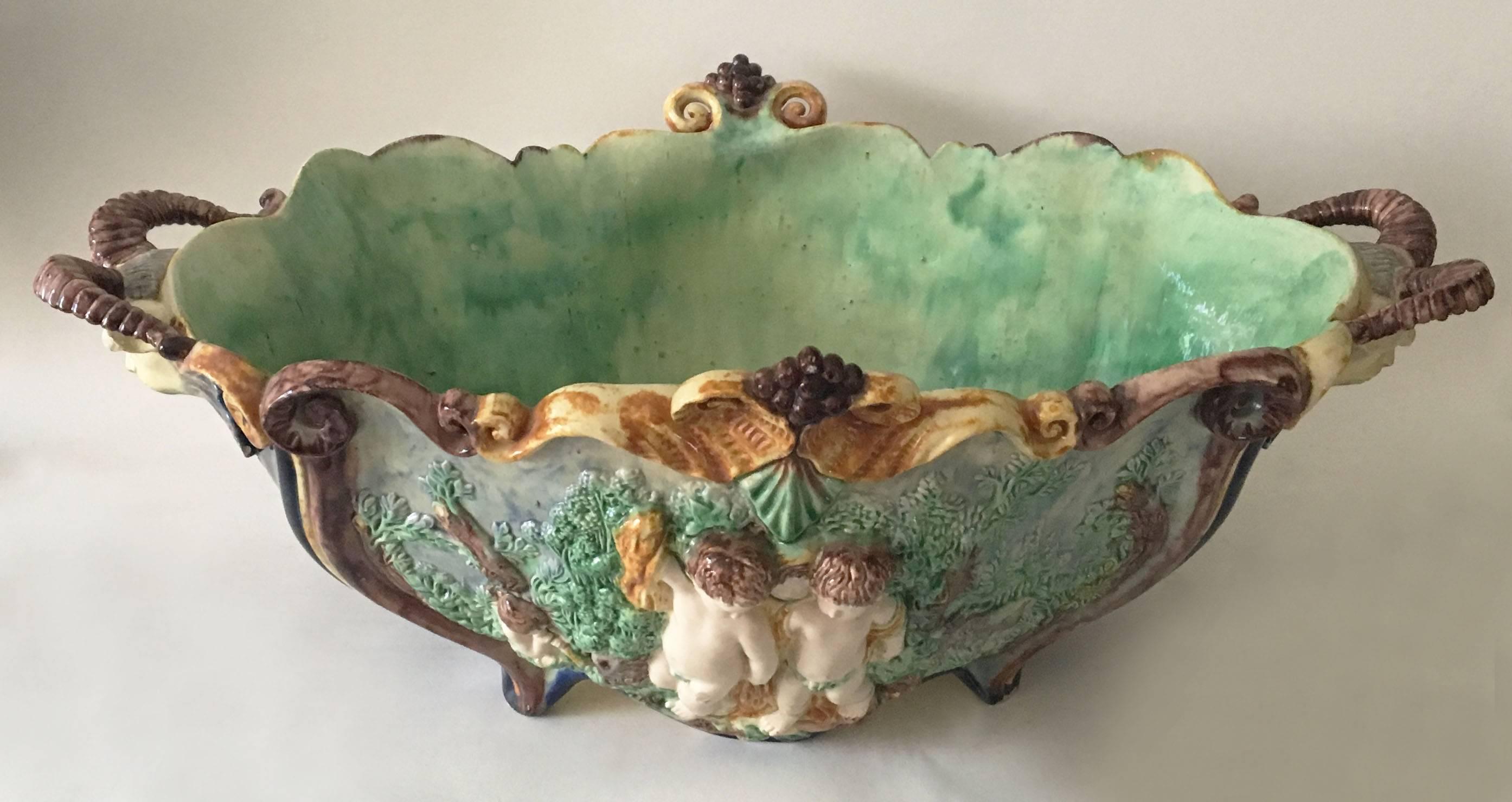Oversize Palissy jardinière inspired by the Renaissance attributed to Thomas Sergent, circa 1880.
Fauns heads handles.
The School of Paris was composed by makers as Victor Barbizet, Francois Maurice, Thomas Sergent, Georges Pull, it's a group of