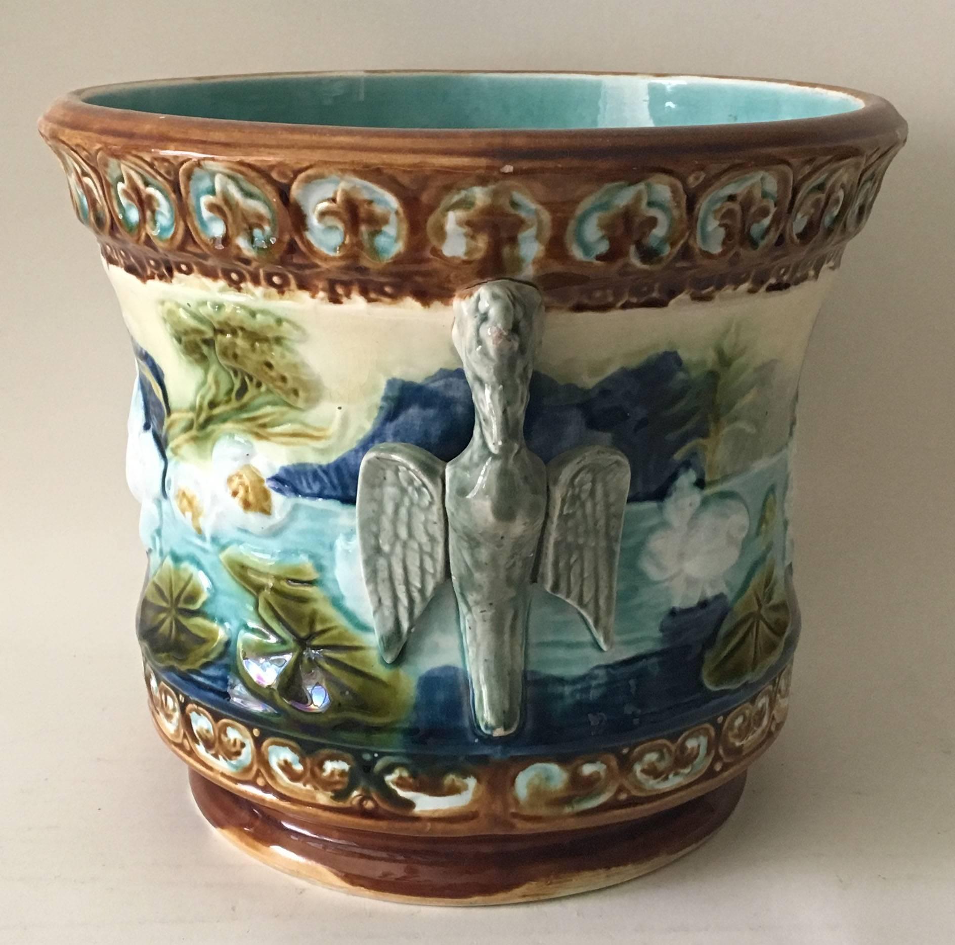 Antique Majolica water lily cache pot from North of France with birds handles, circa 1890.