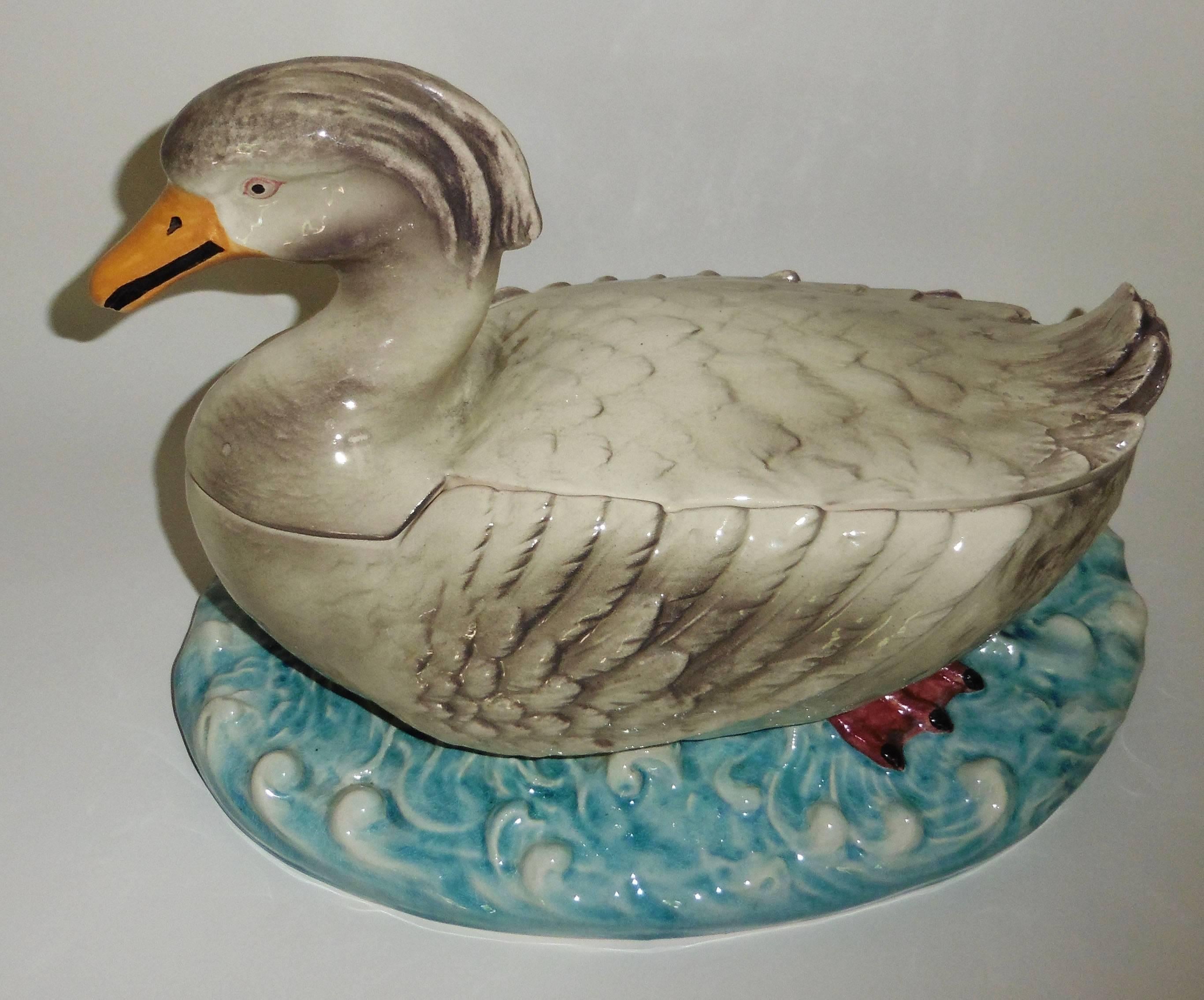 Large fine Majolica duck tureen signed Sarreguemines, circa 1880.
The base imitate the water of the pond.