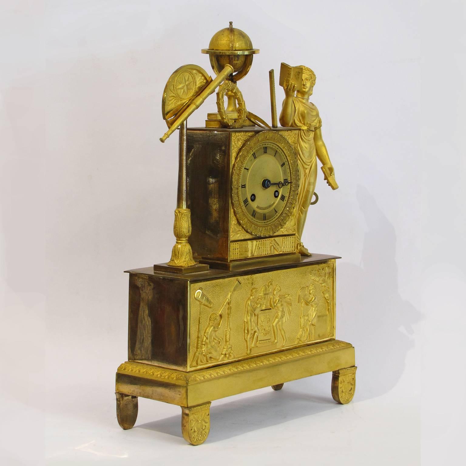An amazing French neoclassical gilt bronze pendulum clock retaining its original ormolu gilding with matte finishes and details made using the technique of lost-wax casting.
The rectangular base is enriched by a relief on its front side showing the