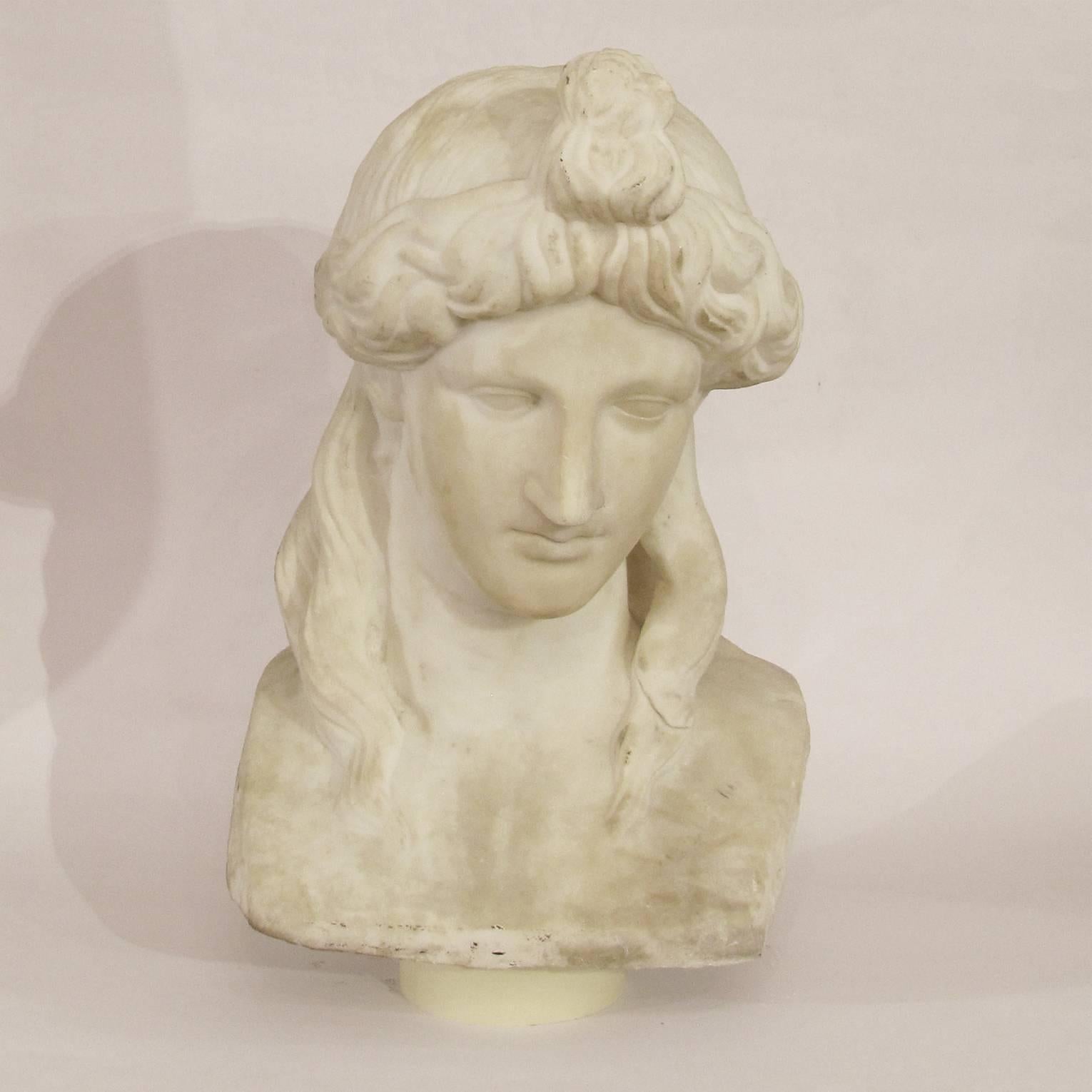 A carved white marble bust of Antinous, depicted with head lowered and turned slightly to sinister.
Italian manufactory from the late 18th century
Antinous (27 November, c. 111 – before 30 October 130) was a Bithynian Greek youth and a favourite,