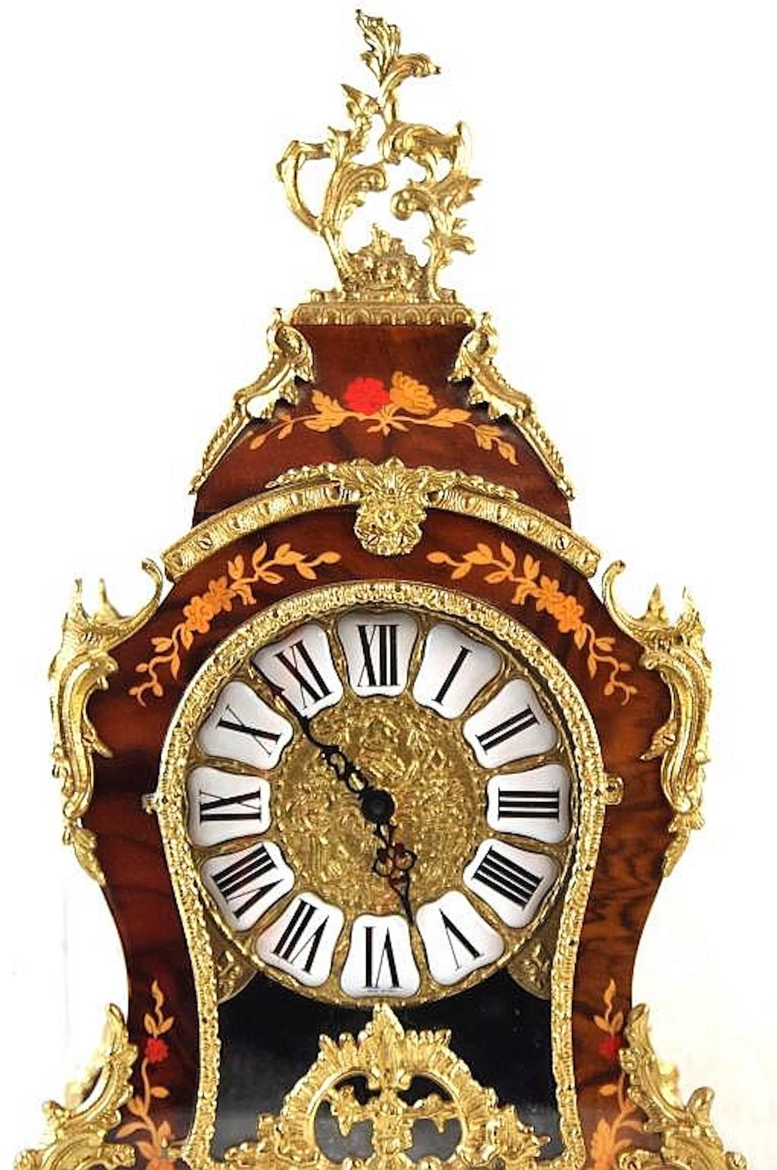 Fine French gilt bronze and inlaid clock with enameled numbers. Antique replica, good condition, battery wind.