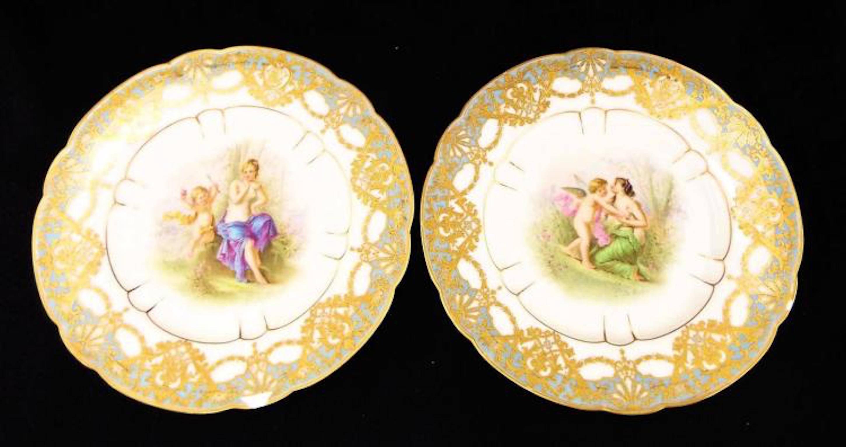 Cherub scenes. Bear mark on back. Both plates show wear on rims. 9.5" diameter. Signed.

Sèvres porcelain, French hard-paste, or true, porcelain as well as soft-paste porcelain (a porcellaneous material rather than true porcelain) made at the