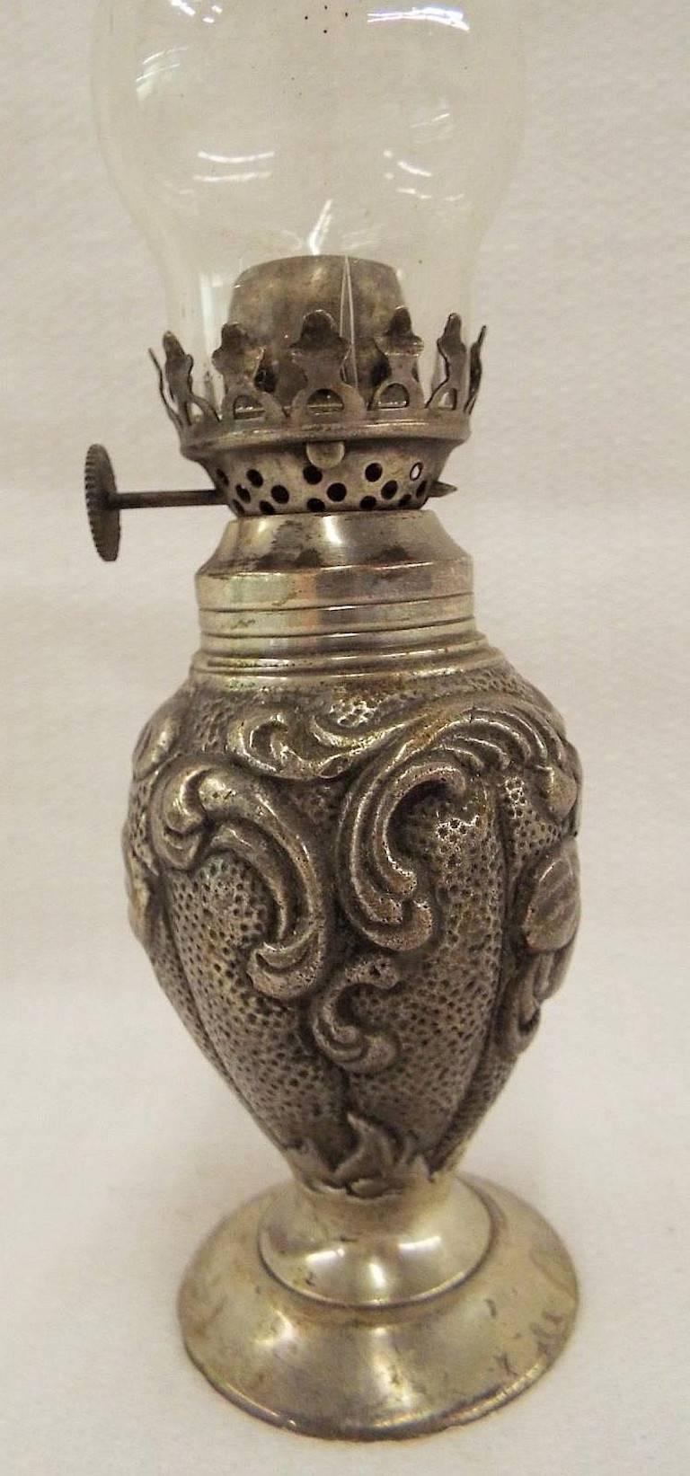 Sterling silver miniature 19th century oil lamp with metal base.