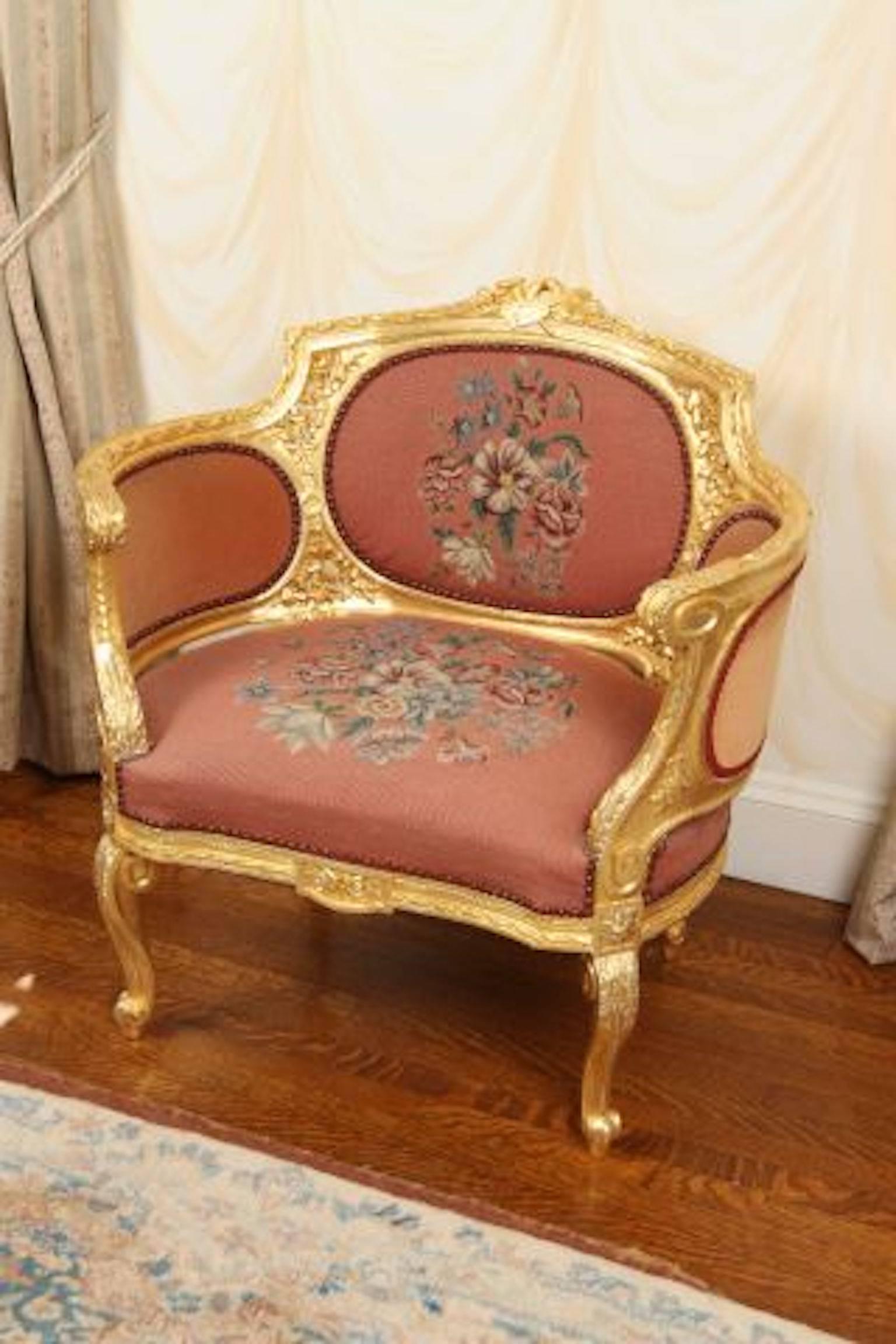 Early 20th Century Carved and Gilt Bergere Armchair In Excellent Condition For Sale In Washington Crossing, PA