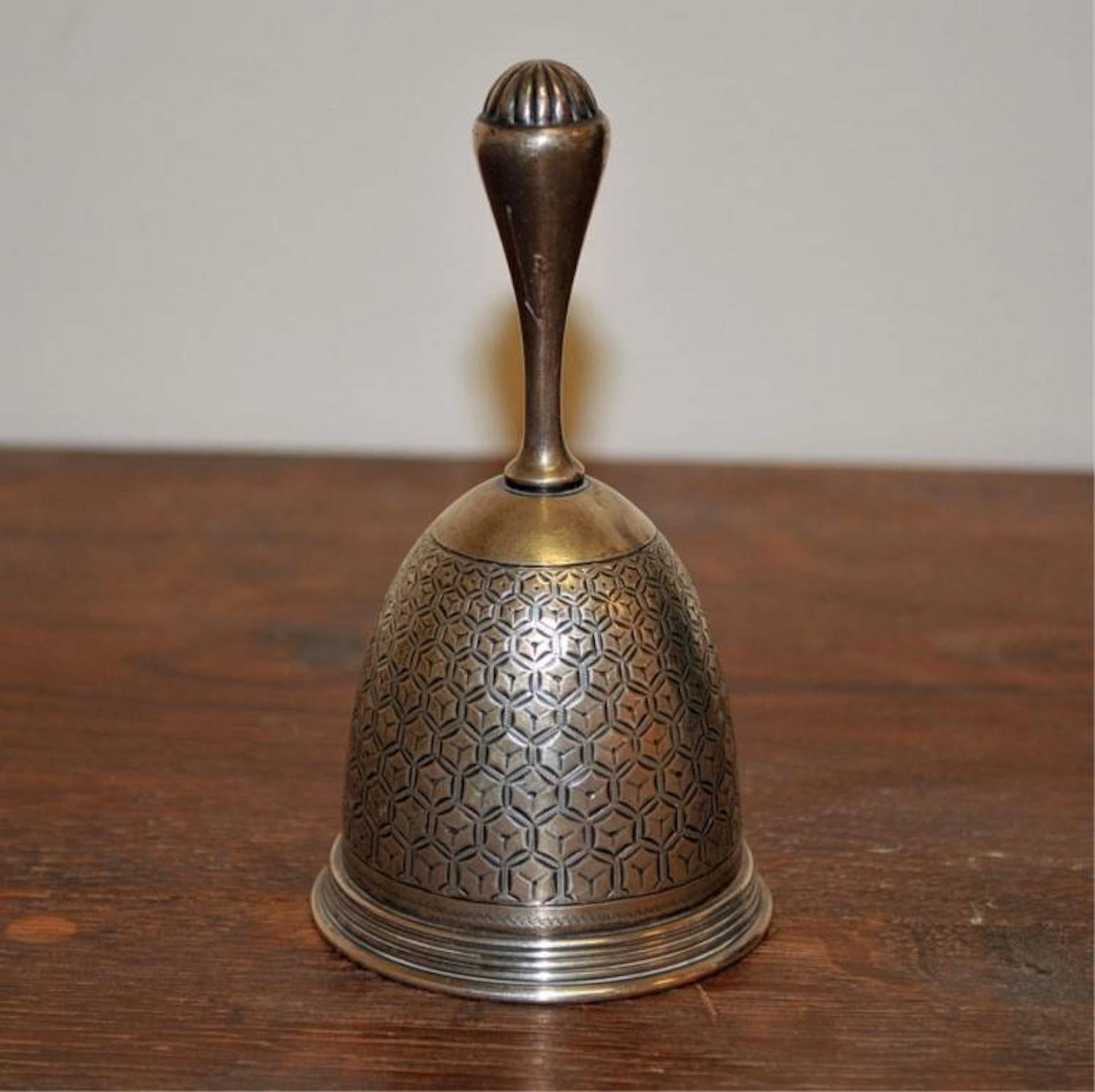 Antique Tiffany & Co. sterling bell with handle. 126.3 grams total weight, sterling clapper has been replaced with brass, 4 1/2" H x 2 1/4" diameter. Very good condition.