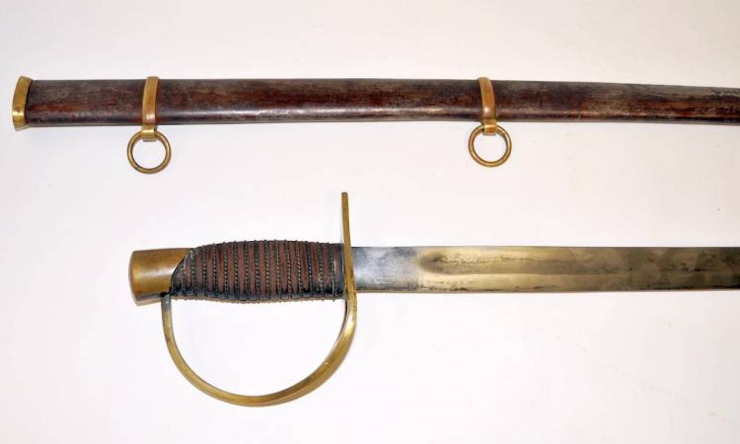 Antique civil war sword with iron scabbard. The steel blade and brass hilt are unmarked. No strap. 41