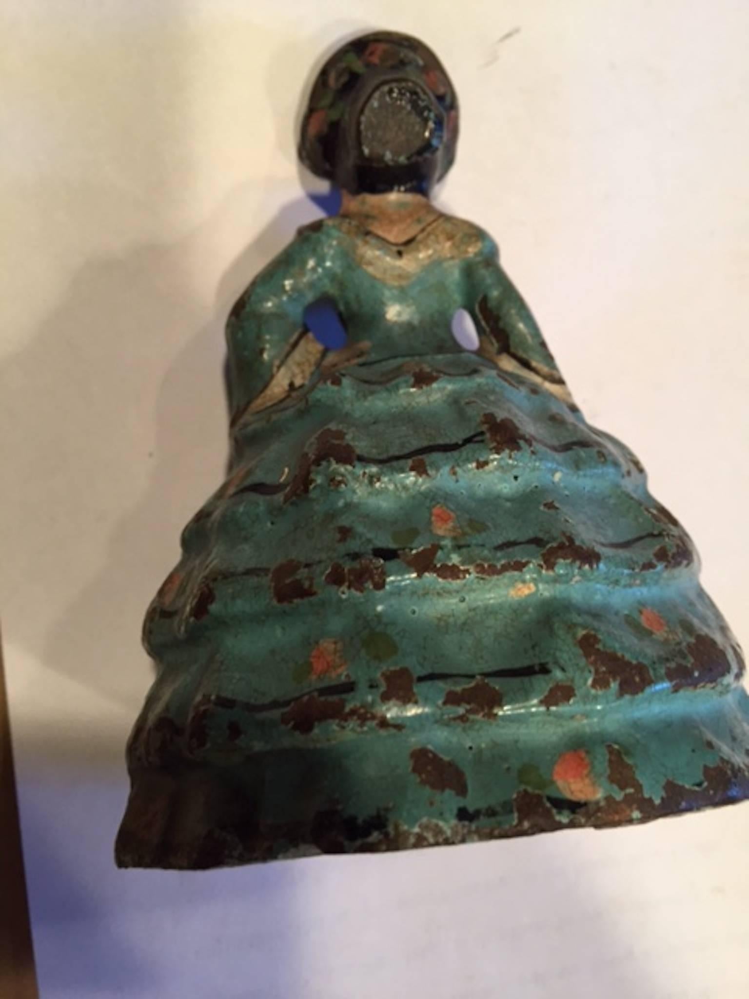 Antique Cast Iron Woman Doorstop Southern Belle
Condition: paint chips and scuffs, generally good.