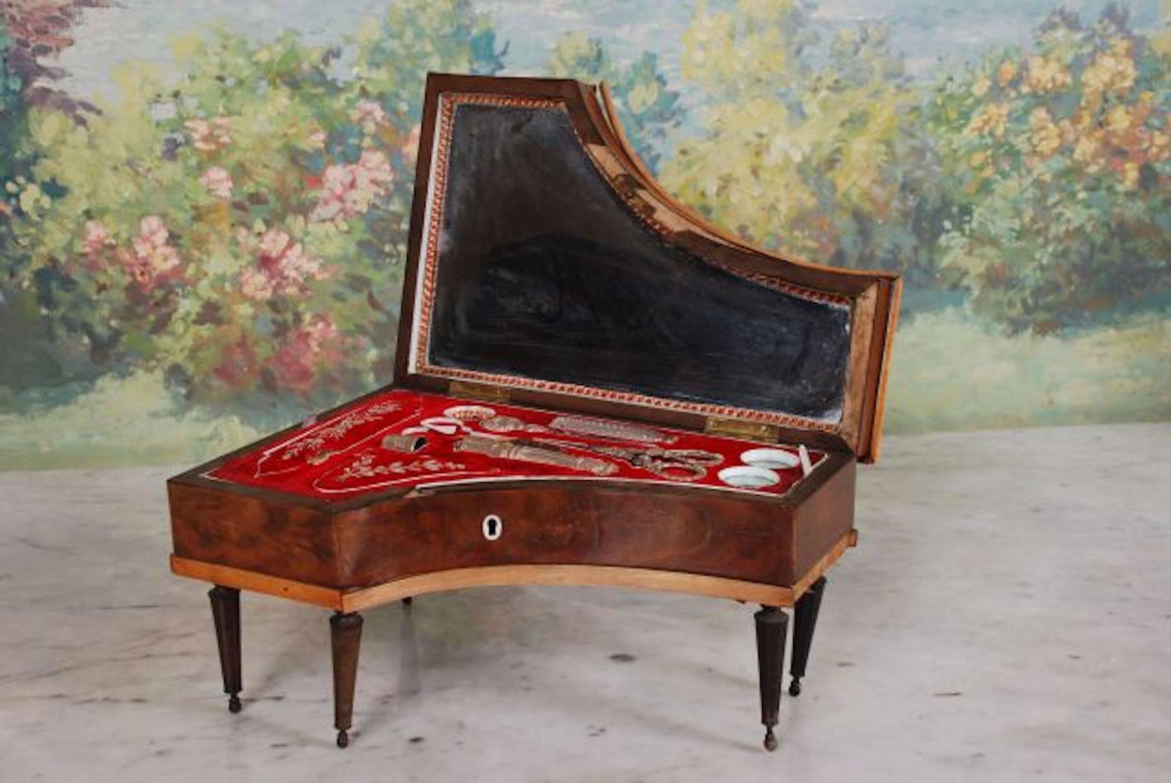 19th century Regency piano form sewing box circa 1820 with fitted red velvet interior.