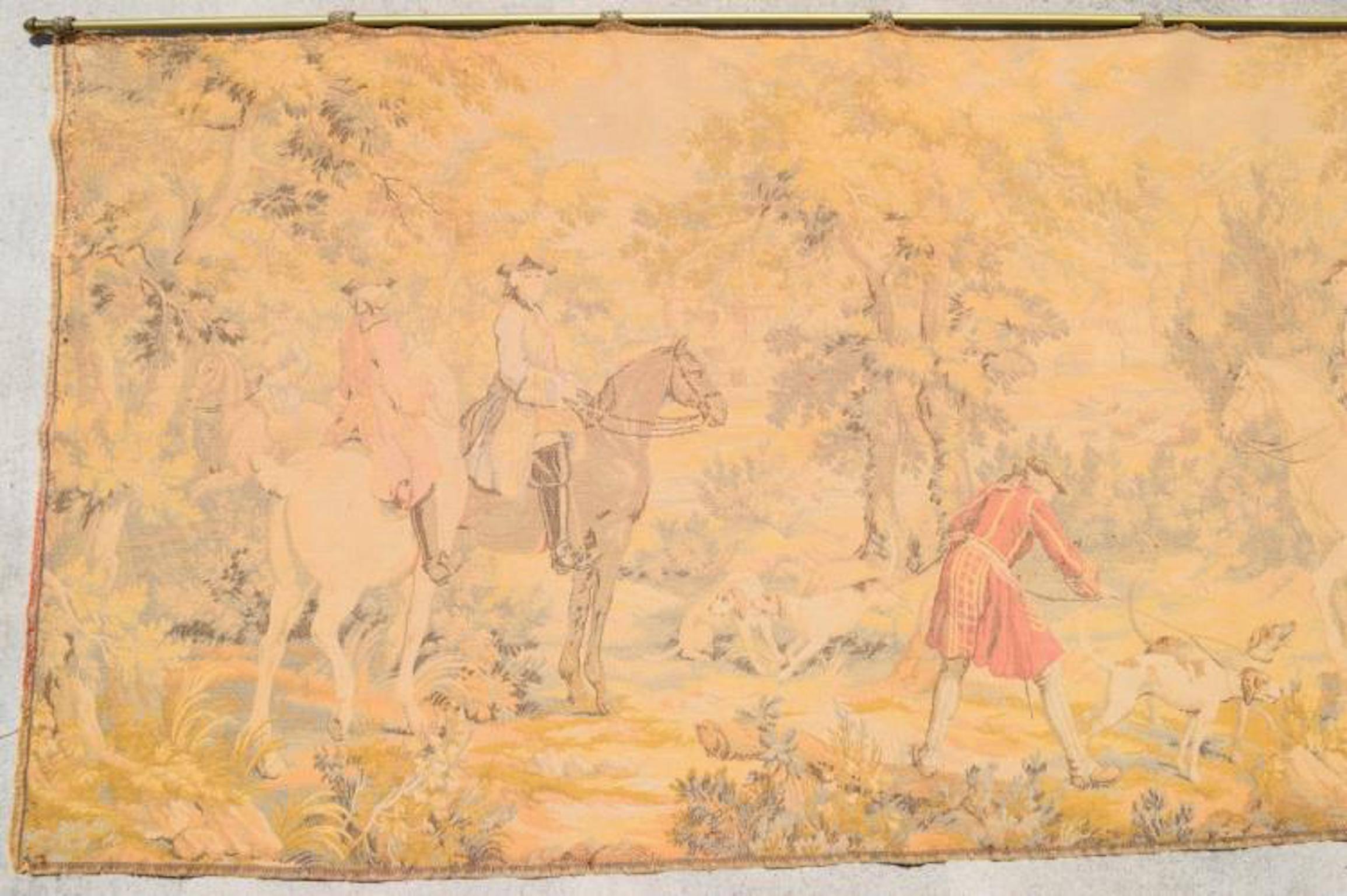 19th century French Rococo Revival tapestry textile depicting a forest scene with men on horses and a man with two dogs.