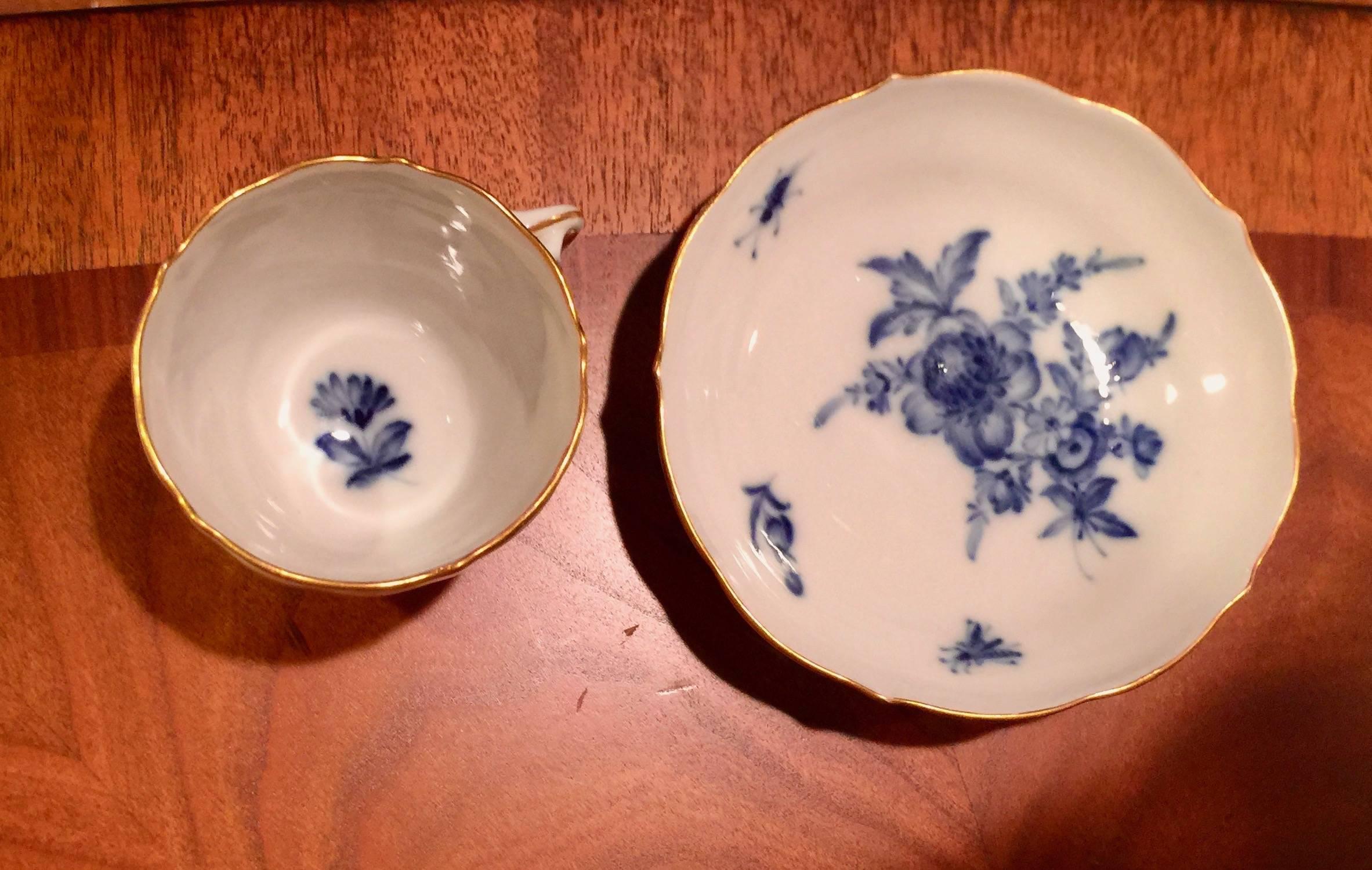 19th century German Meissen Porcelain cup and saucer
White with gold rim and blue flowers
Saucer 4.5 inches diameter
Cup 2.25" diameter 2" height.