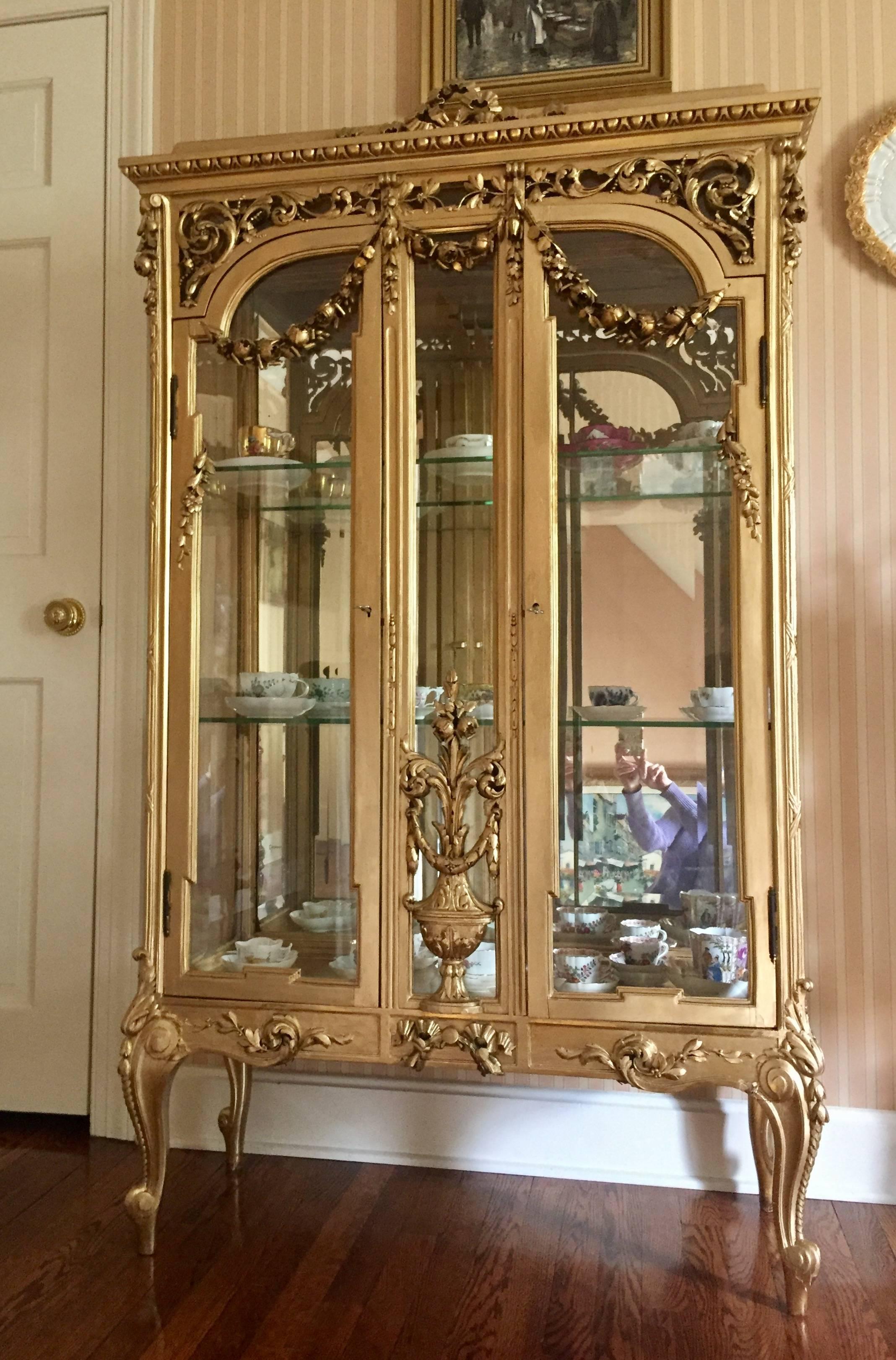 Beautiful carved 19th century French Louis XVI style giltwood vitrine.