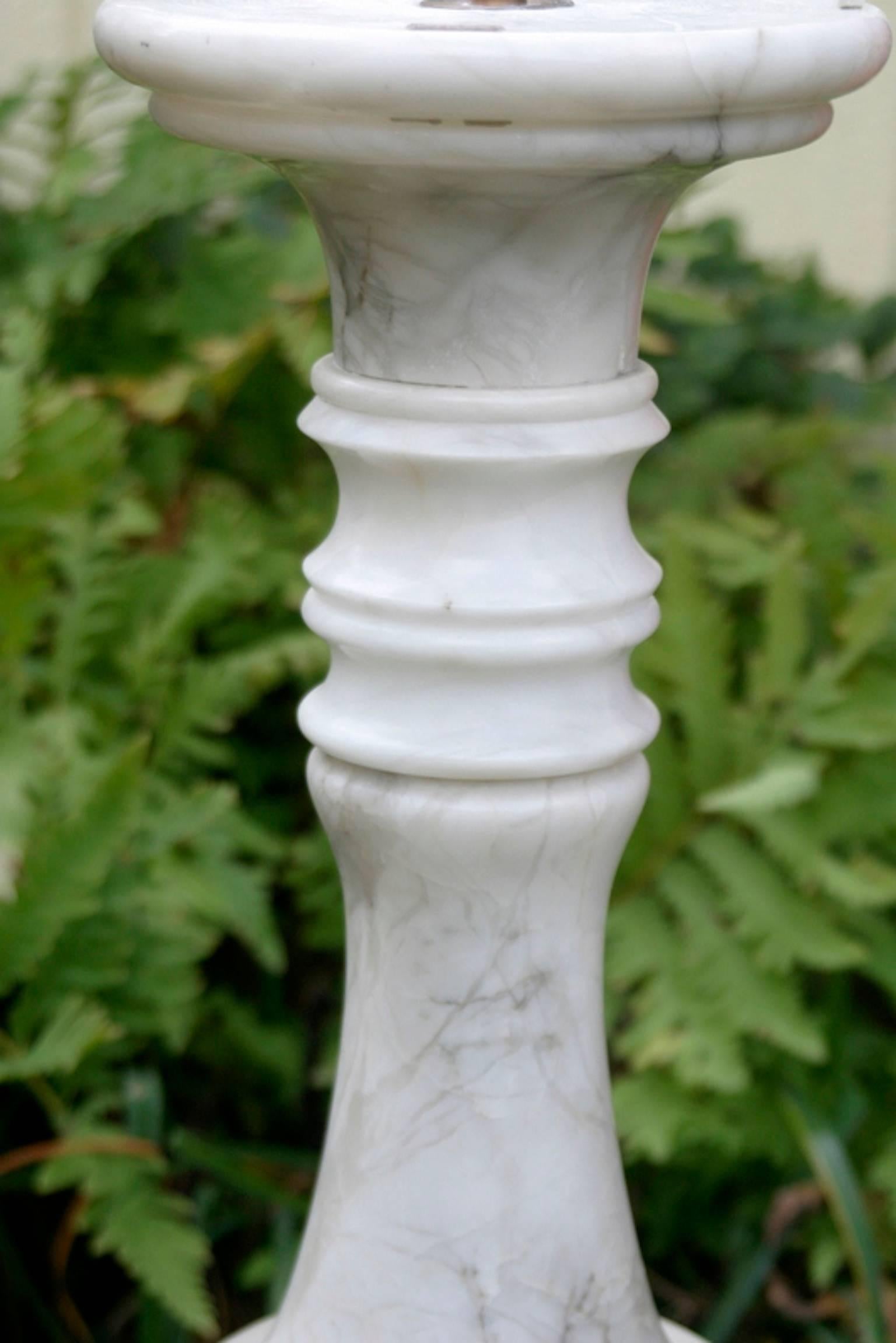 white pedestal column