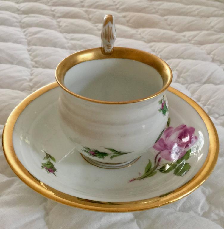 19th century Meissen Porcelain moss rose cup and saucer painted with gold gilt and roses
Measures: Saucer 5.63