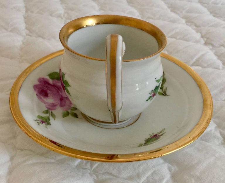 Gilt 19th Century Meissen Porcelain Moss Rose Cup and Saucer For Sale