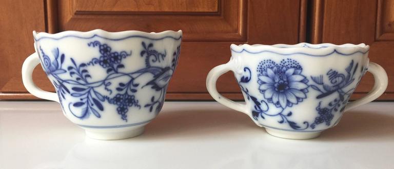 Meissen blue onion cups and saucers set of eight. With assorted Meissen marks.
The mark identifies these as pieces of the Zwiebelmuster Onion Pattern Porcelain. They used this mark from 1885 through 1934.
Two cups measure 2.75 in H 3.88 in D
Six