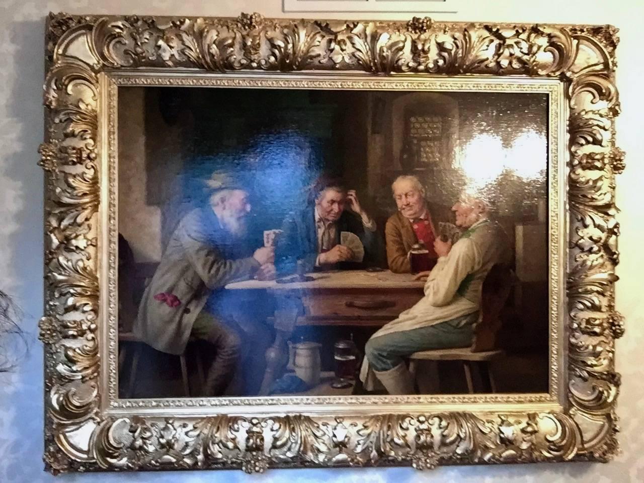 Munich art and portrait painter, who describes the four men in the Bavarian inn very realistically and with love for the detail. Beautifully framed. Wagner-Höhenberg, Josef. 1870 Höhenberg - 1939. The card game. Oil /canvas. Signed & re.