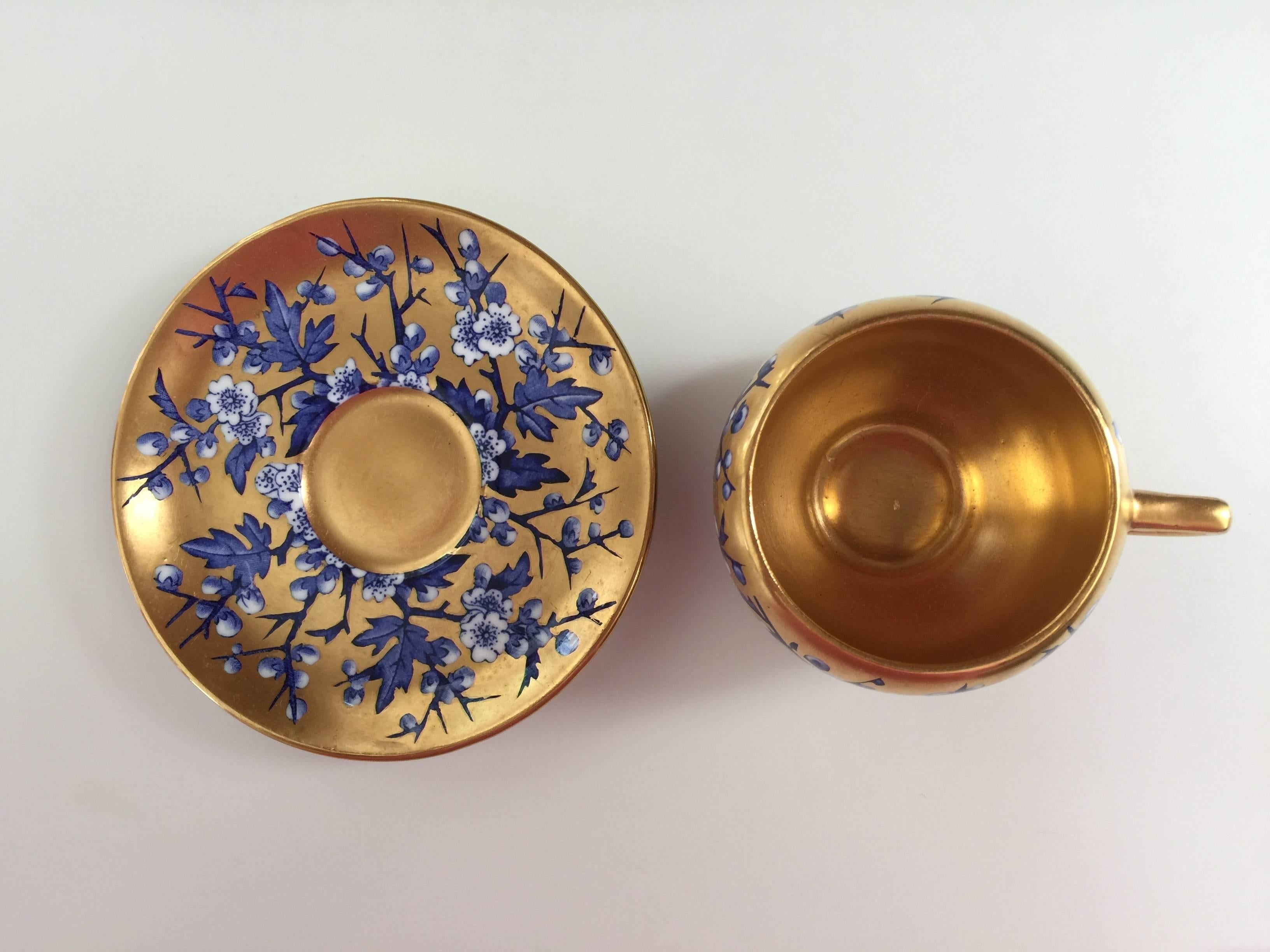 Coalport porcelain cup and saucer, mid-18th century
Gilt with blue flowers and leaves, dated 1750.
