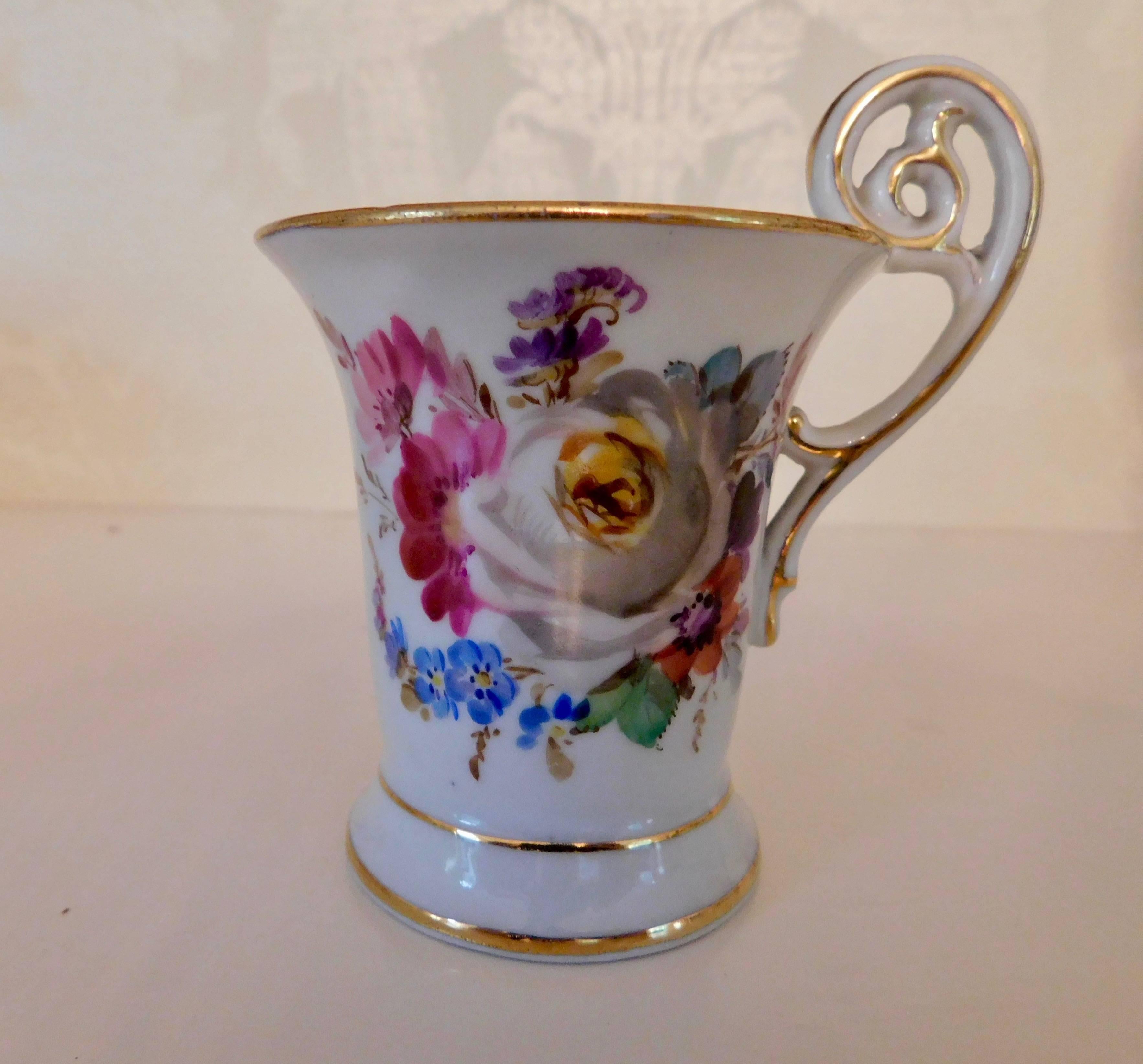20th century Meissen Porcelain demitasse cup and saucer
Beautiful painted floral pattern with gold trim.
Measurements in inches:
Cup 2.13 D x 3.75 H
Saucer 4.5 D x 1 H.