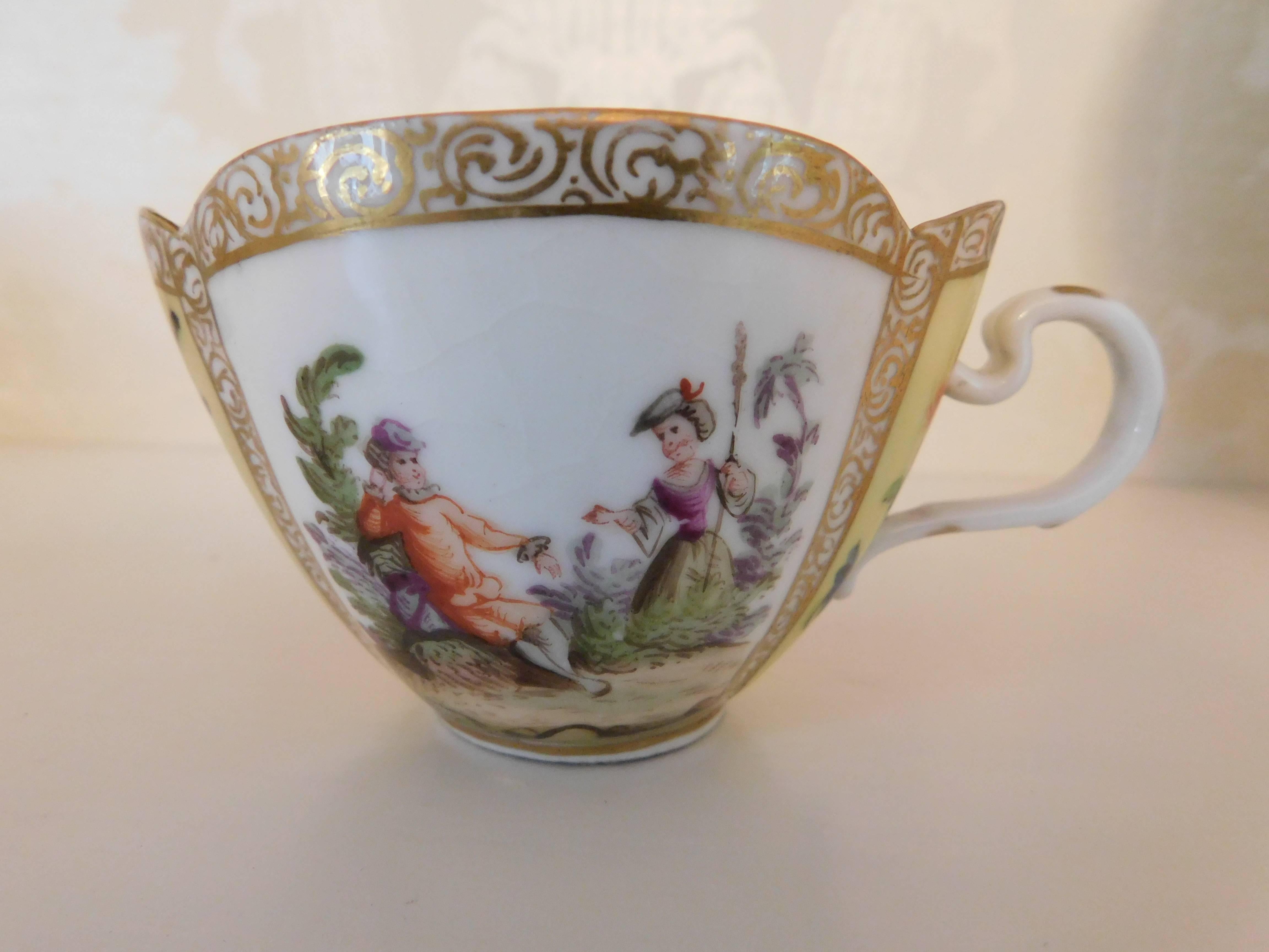 19th century Meissen Porcelain quatrefoil cup and saucer 
Beautifully painted with flowers and people with gold trim.

Measurements in inches:
Cup 4.25 W x 3 D x 2.25 H
Saucer 5.25 W x 4.63 D x 1.25 H.


  