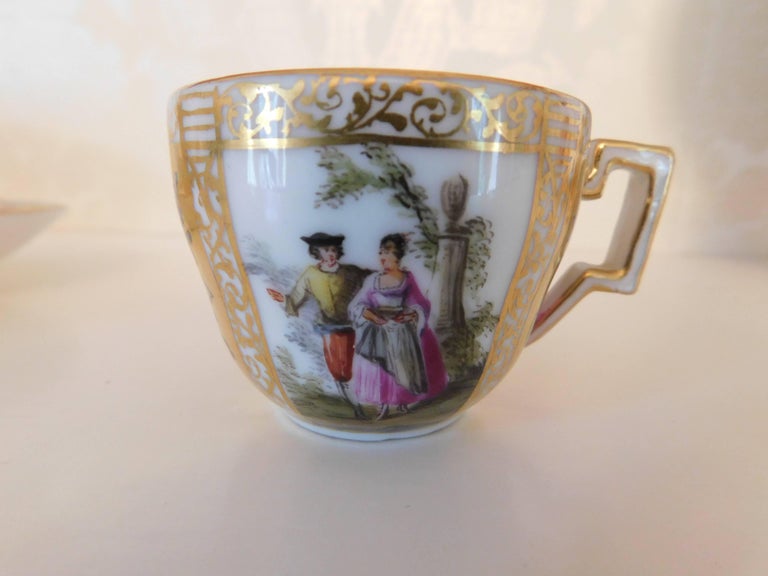 Early 18th century antique Meissen porcelain miniature cup and saucer
with Augustus Rex Markings

Measurements in inches:

Cup 2 D x 1.75 H
Saucer 4.25 D x 1 H.