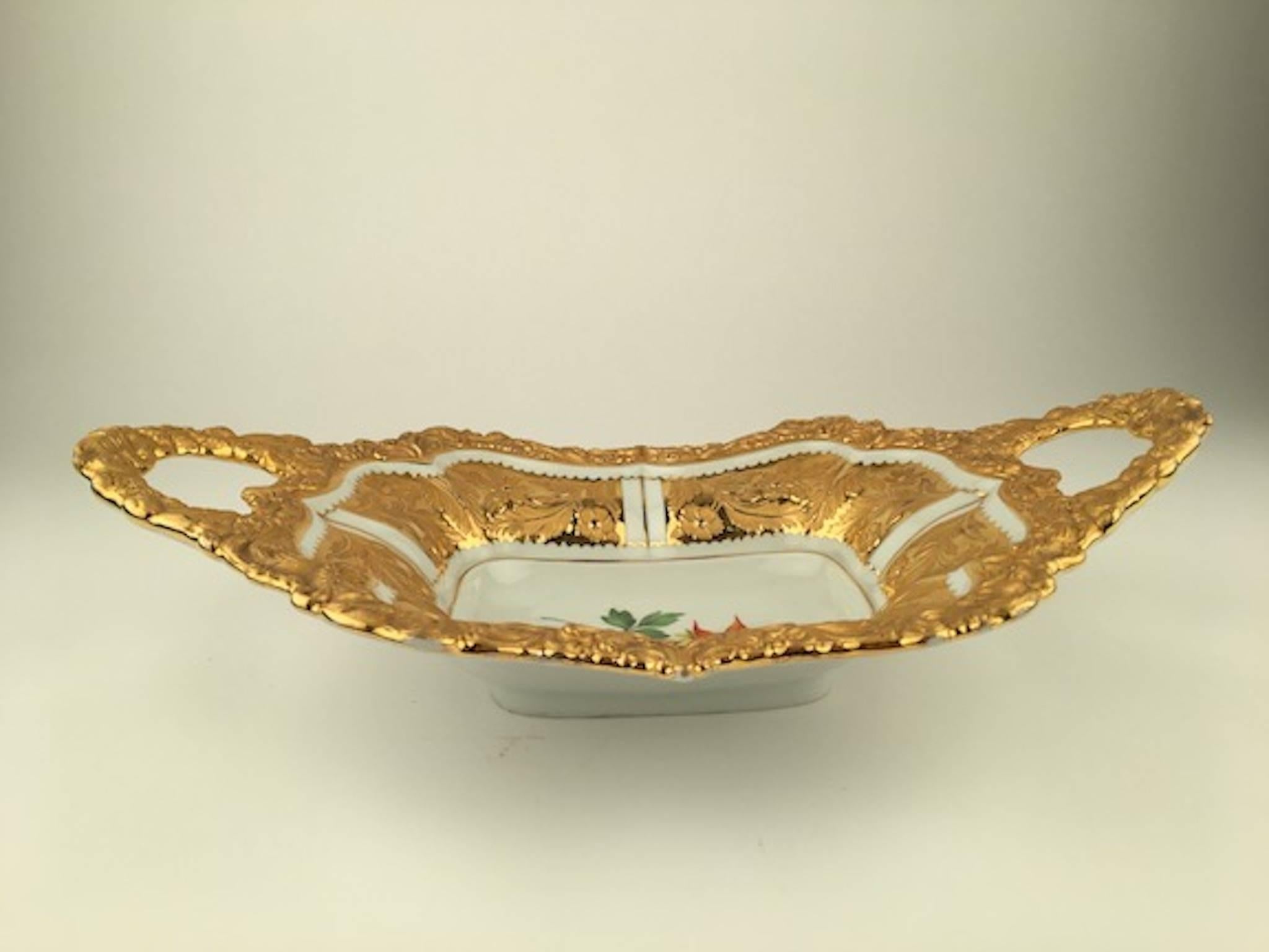 Early 20th century Meissen two handle serving tray with gold gilt handles and boarder.
Marked with the Meissen logo and two slashes under the logo.