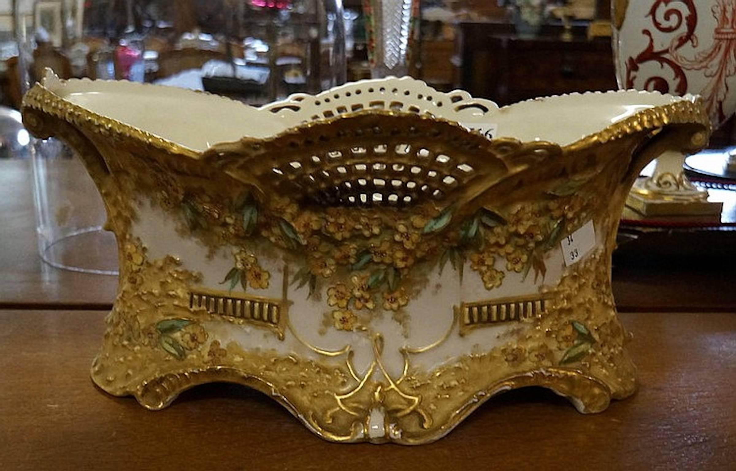 19th century gilded and hand-painted floral jardiniere.
Stamped Wien Teplitz Austria.
