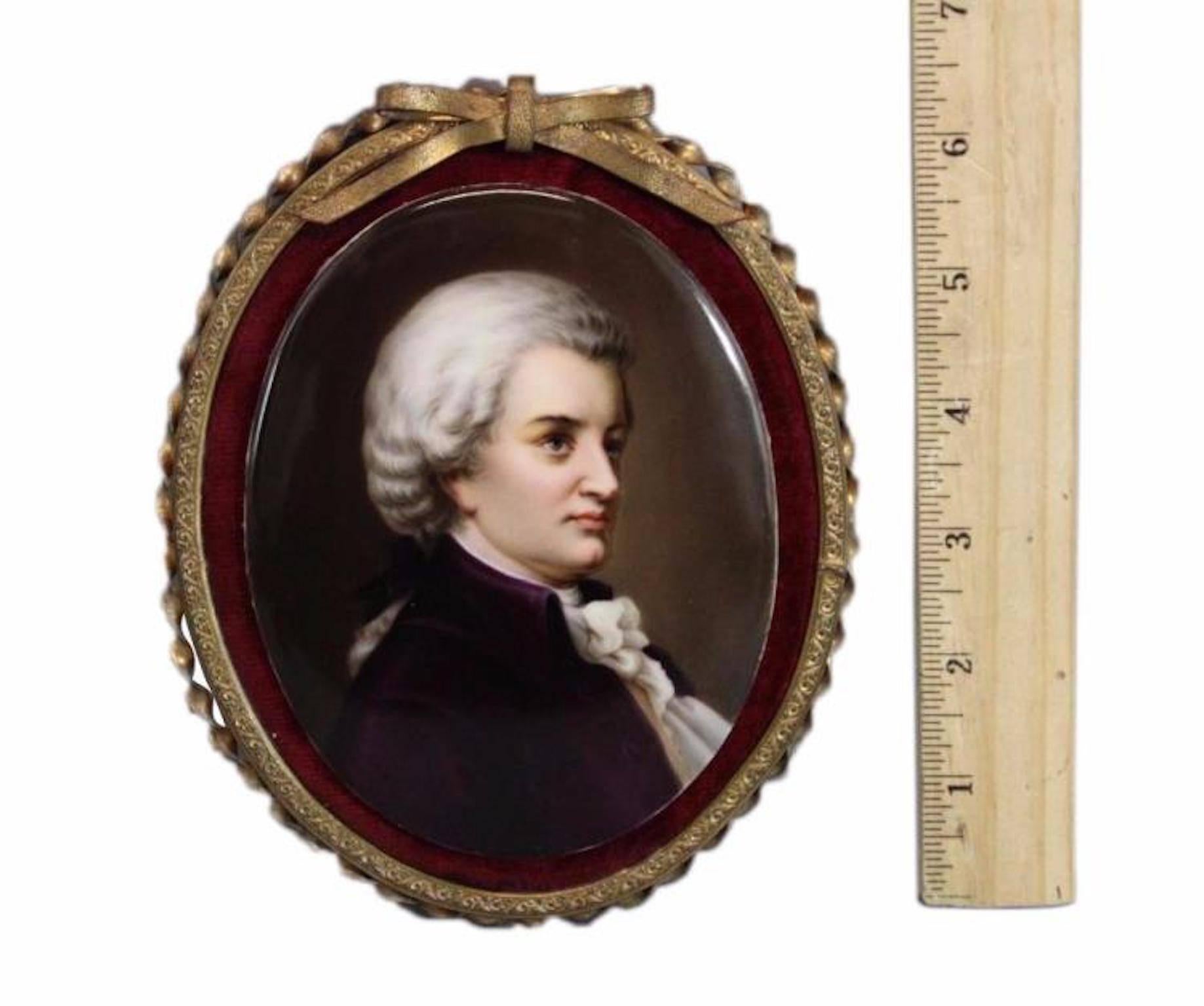 19th century Continental miniature porcelain portrait of an 18th century gentleman with powdered wig. Ornate velvet lined frame.
