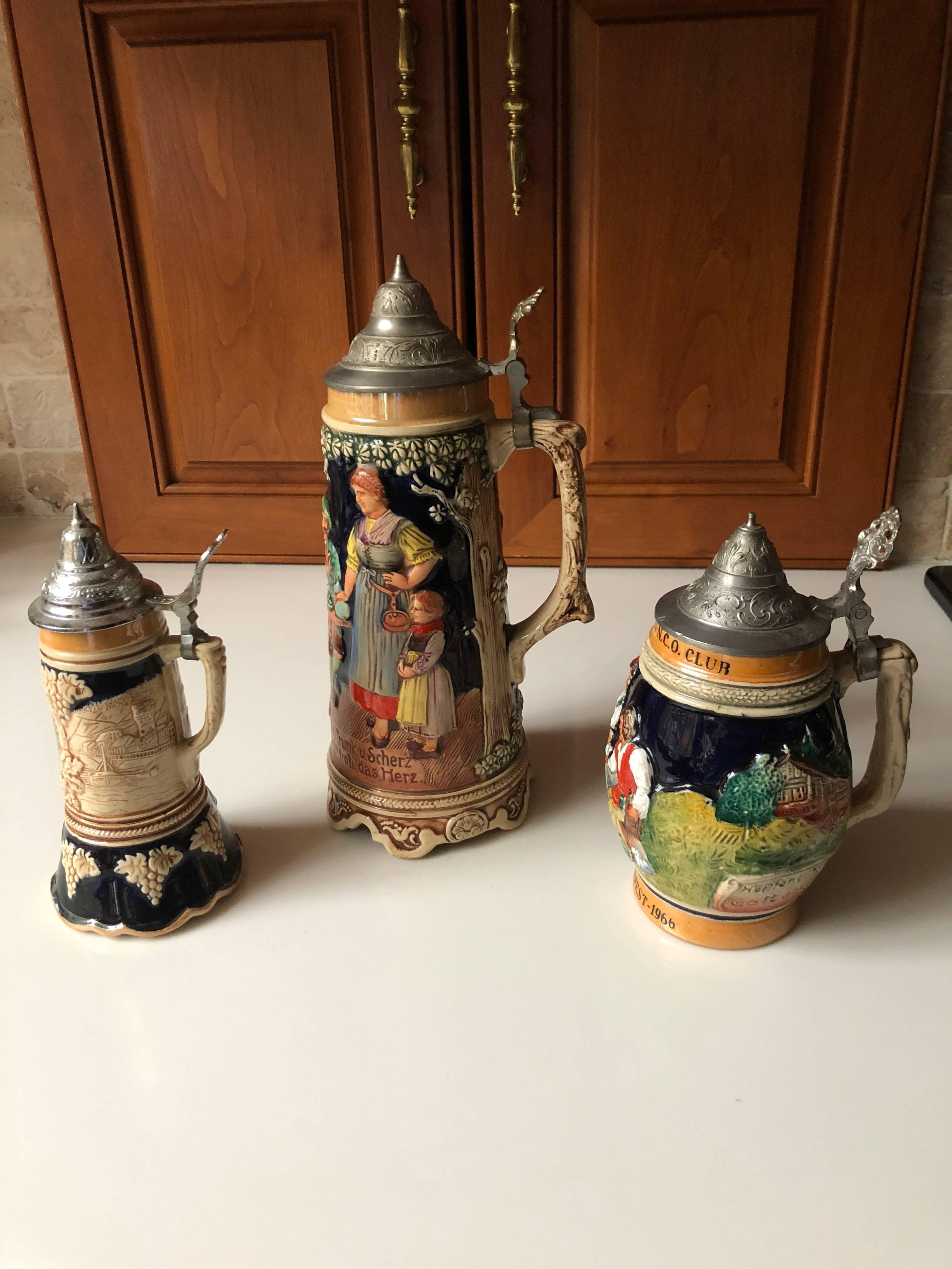 Set of three vintage German & Switzerland beer steins
The large beer stein is also a Thorens music box
Stamped
Measurements in inches:
4.75 D x 11.5 H
3.75 D x 8 H
5 D x 8 H.
